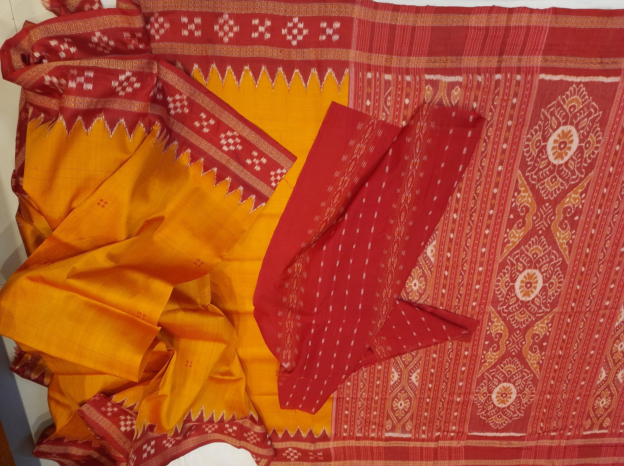 Golden Odisha Khandua Pata Silk Saree paired with cotton ikat blouse piece
