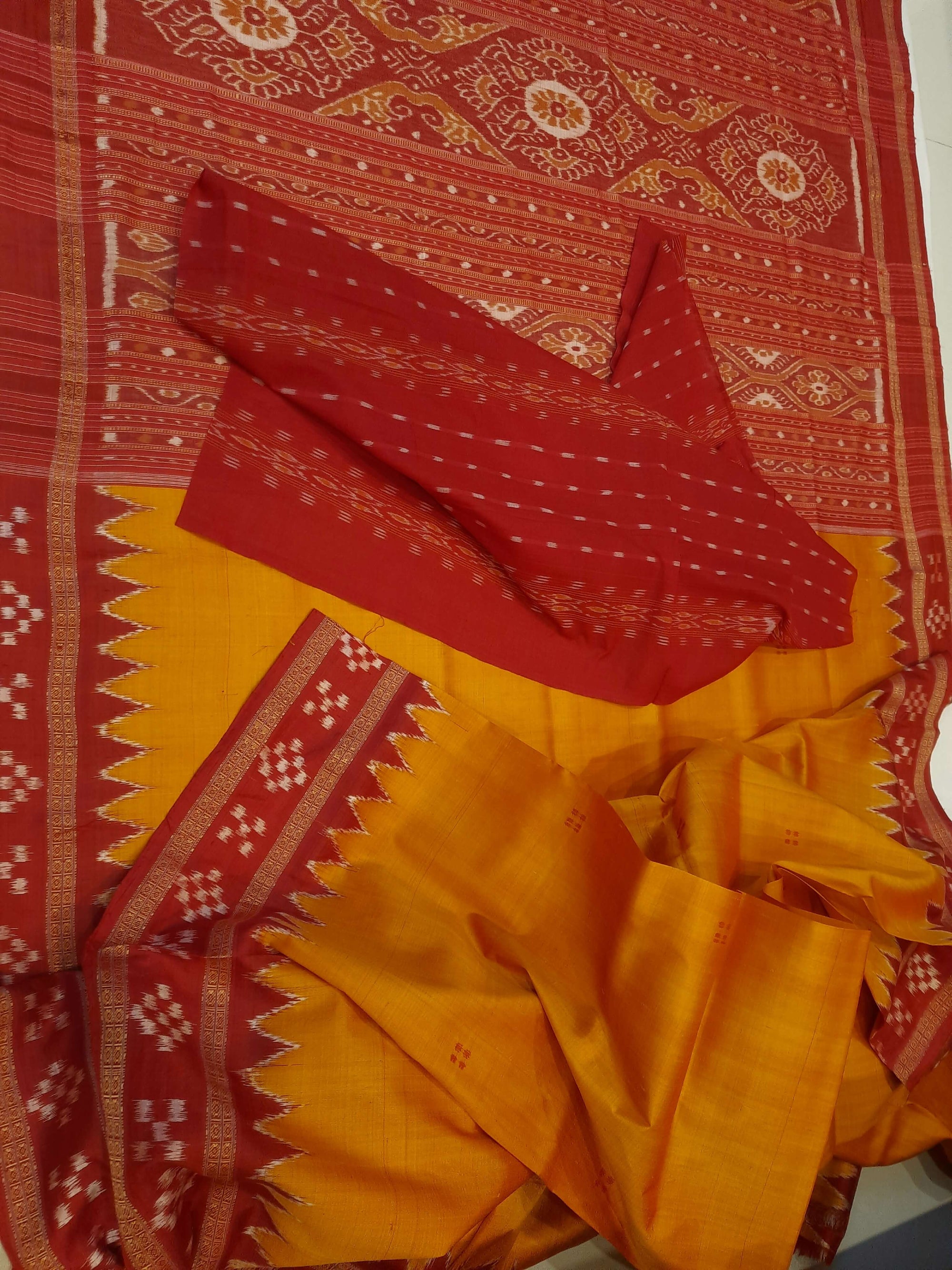 Golden Odisha Khandua Pata Silk Saree paired with cotton ikat blouse piece
