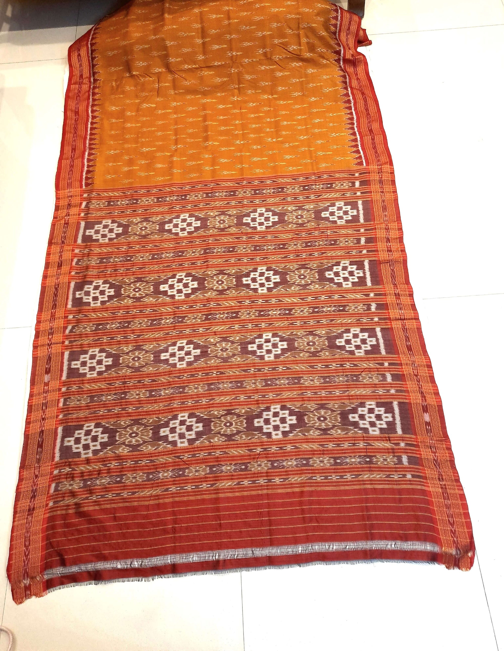 Golden with Red Odisha Khandua Pata Silk Saree paired with cotton ikat blouse piece