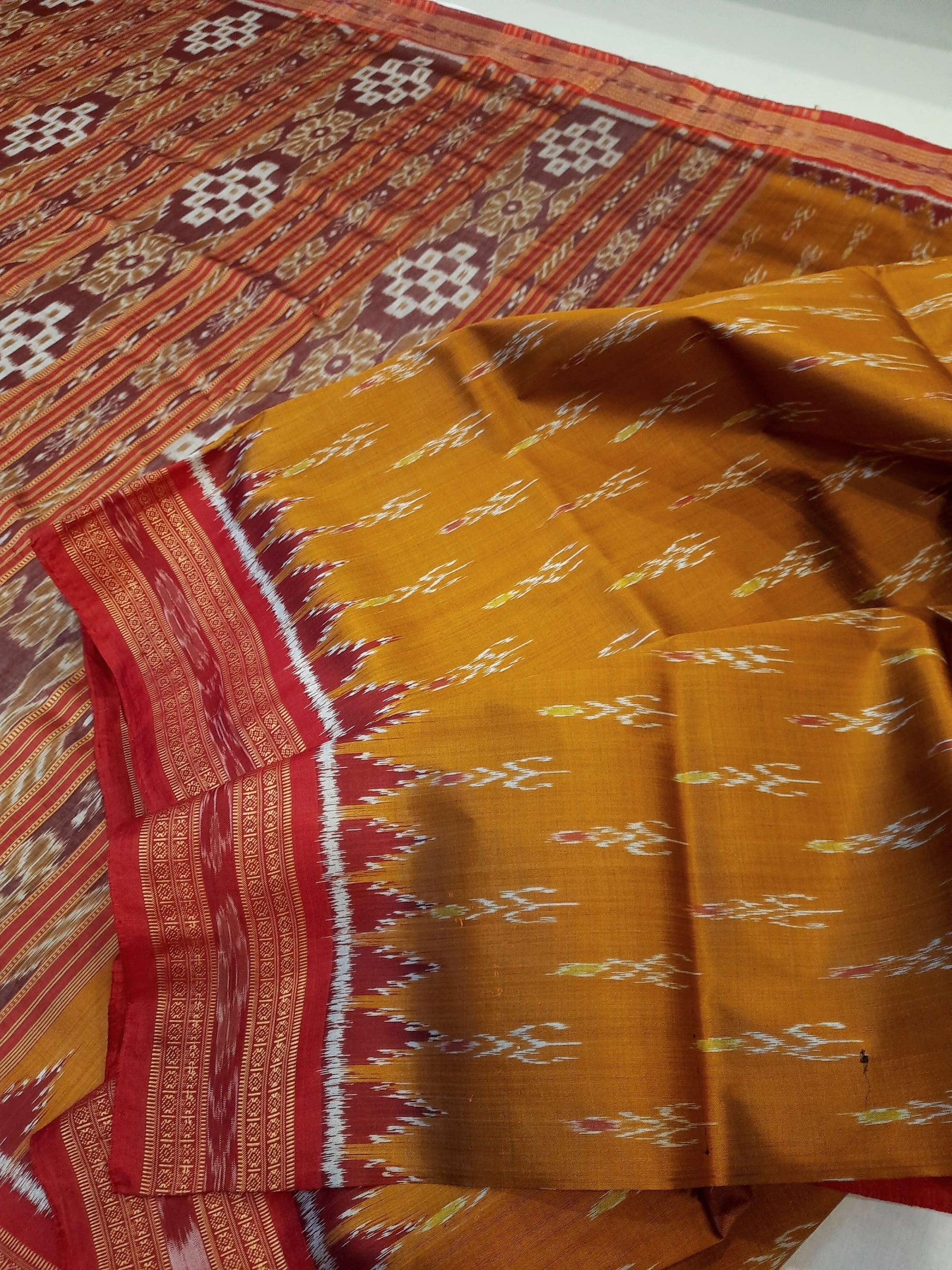 Golden with Red Odisha Khandua Pata Silk Saree paired with cotton ikat blouse piece
