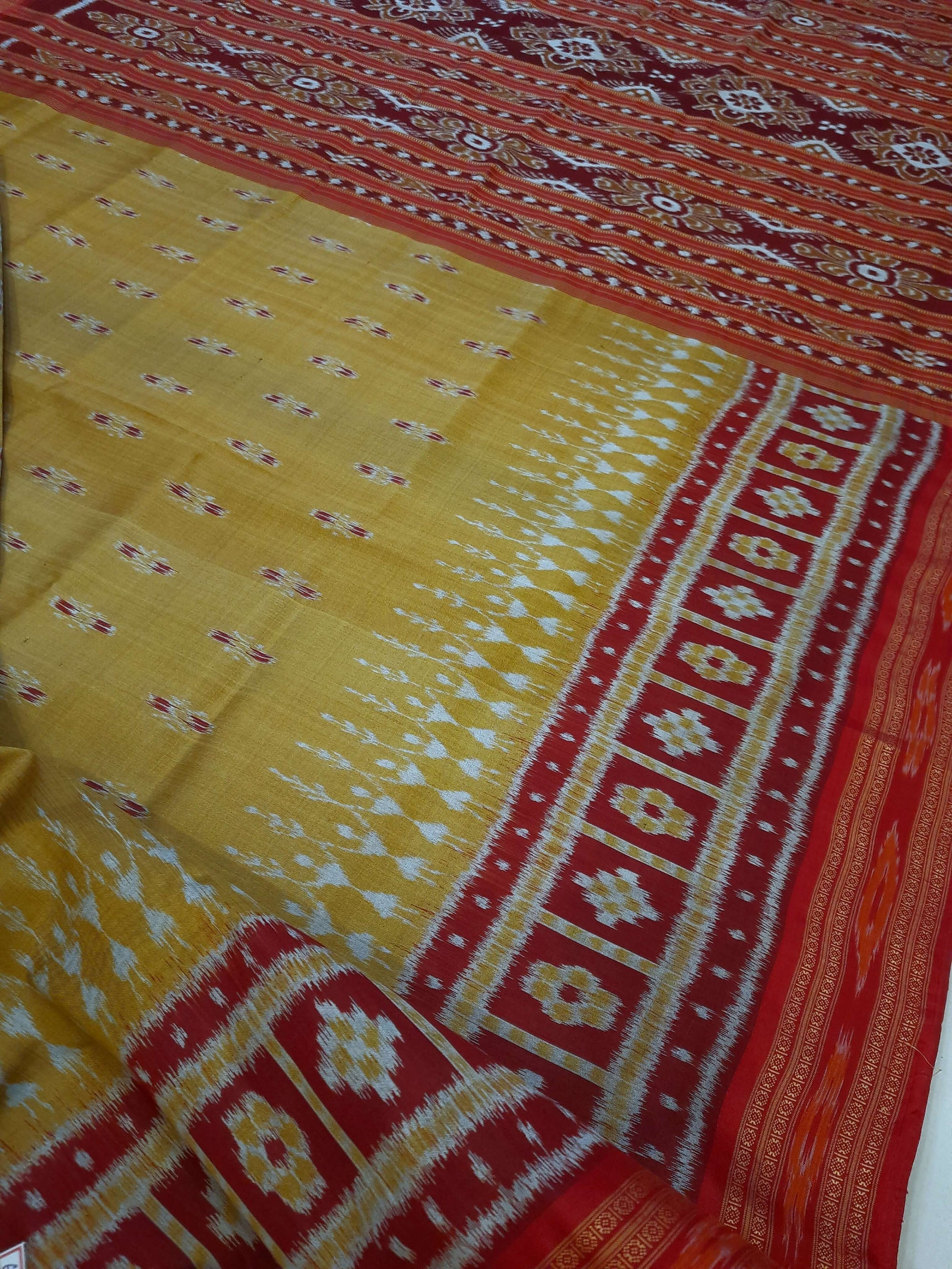 Golden wide border Odisha Khandua Pata Silk Saree paired with cotton ikat blouse piece