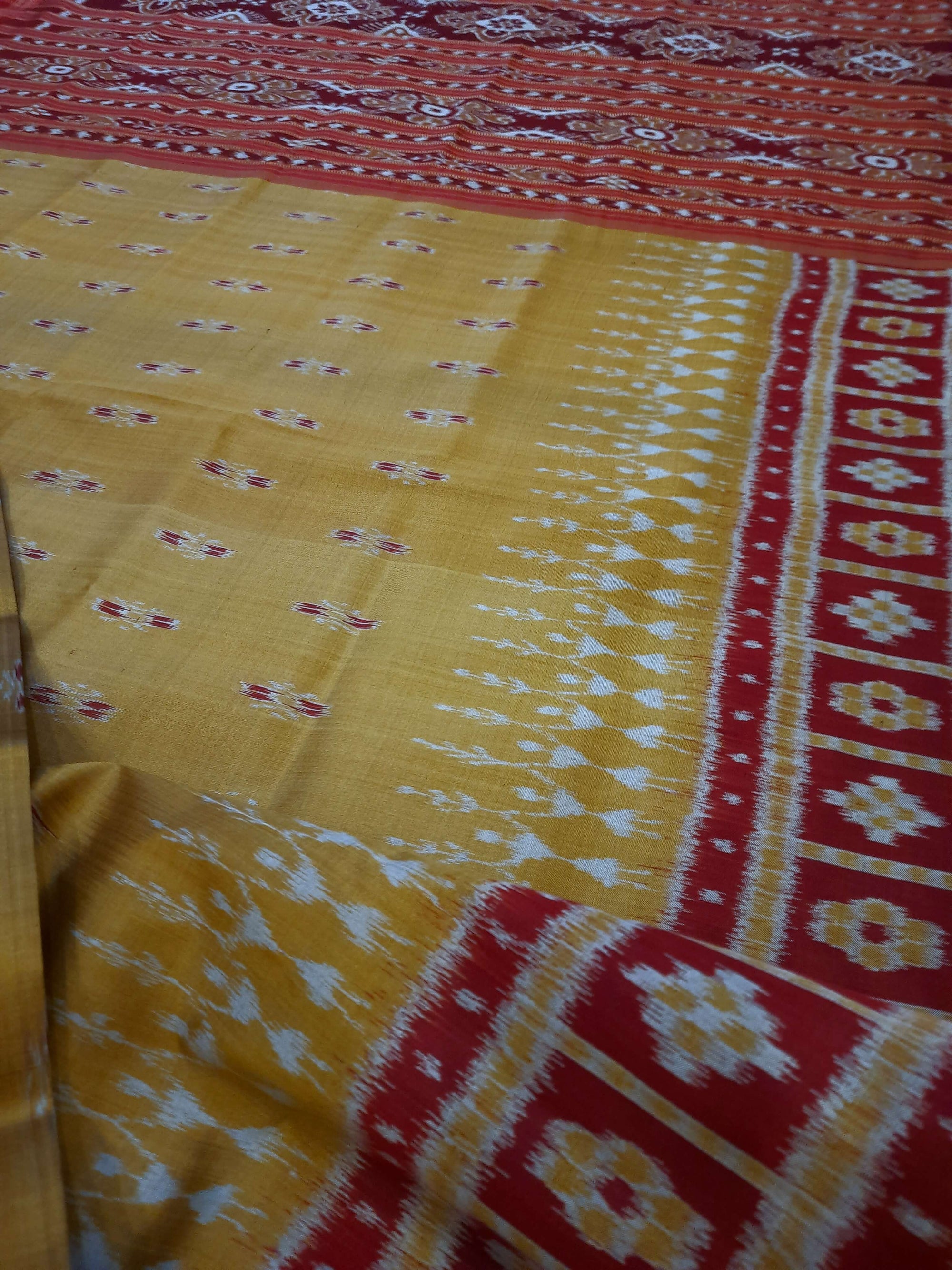 Golden wide border Odisha Khandua Pata Silk Saree paired with cotton ikat blouse piece