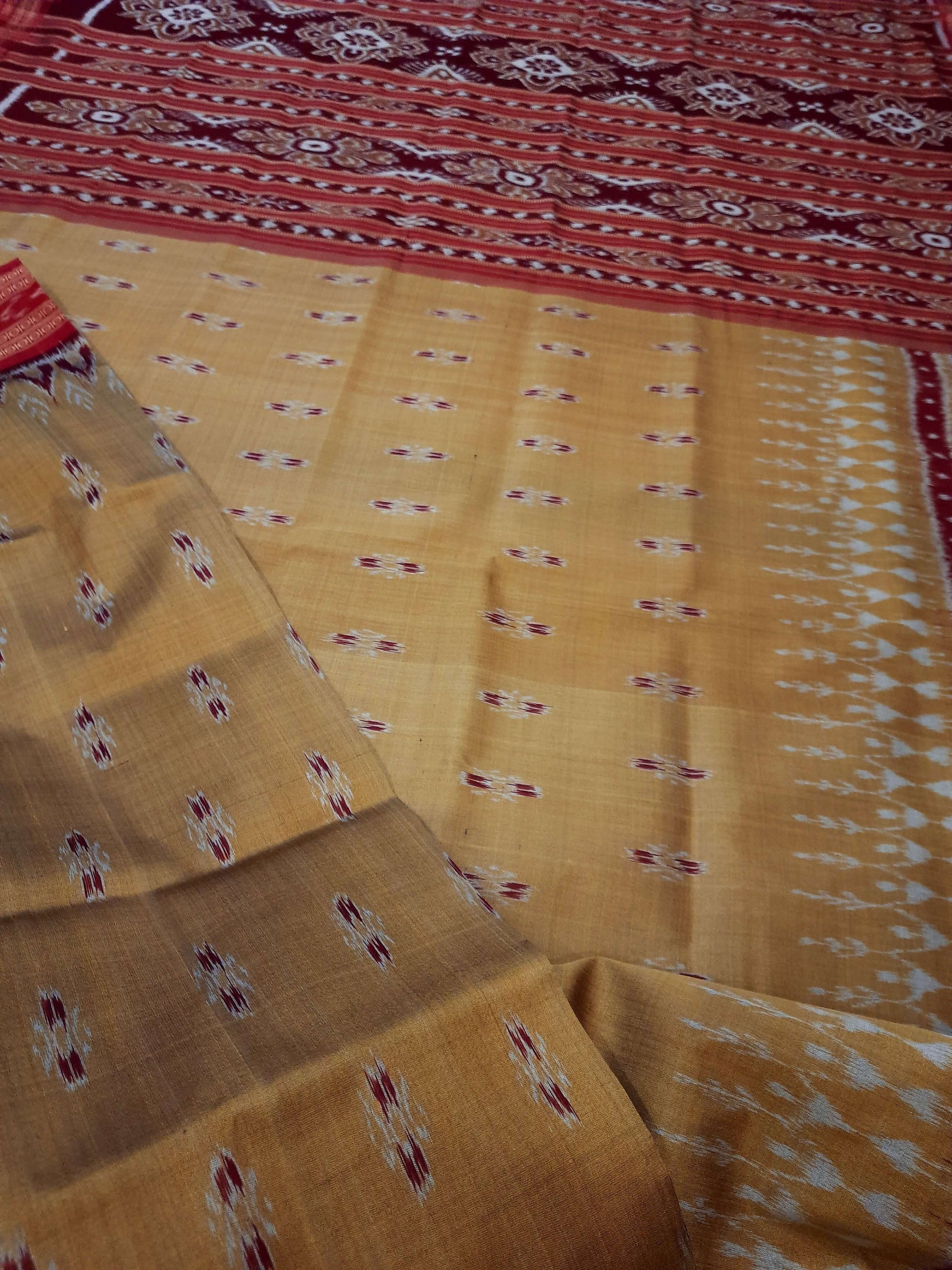 Golden wide border Odisha Khandua Pata Silk Saree paired with cotton ikat blouse piece