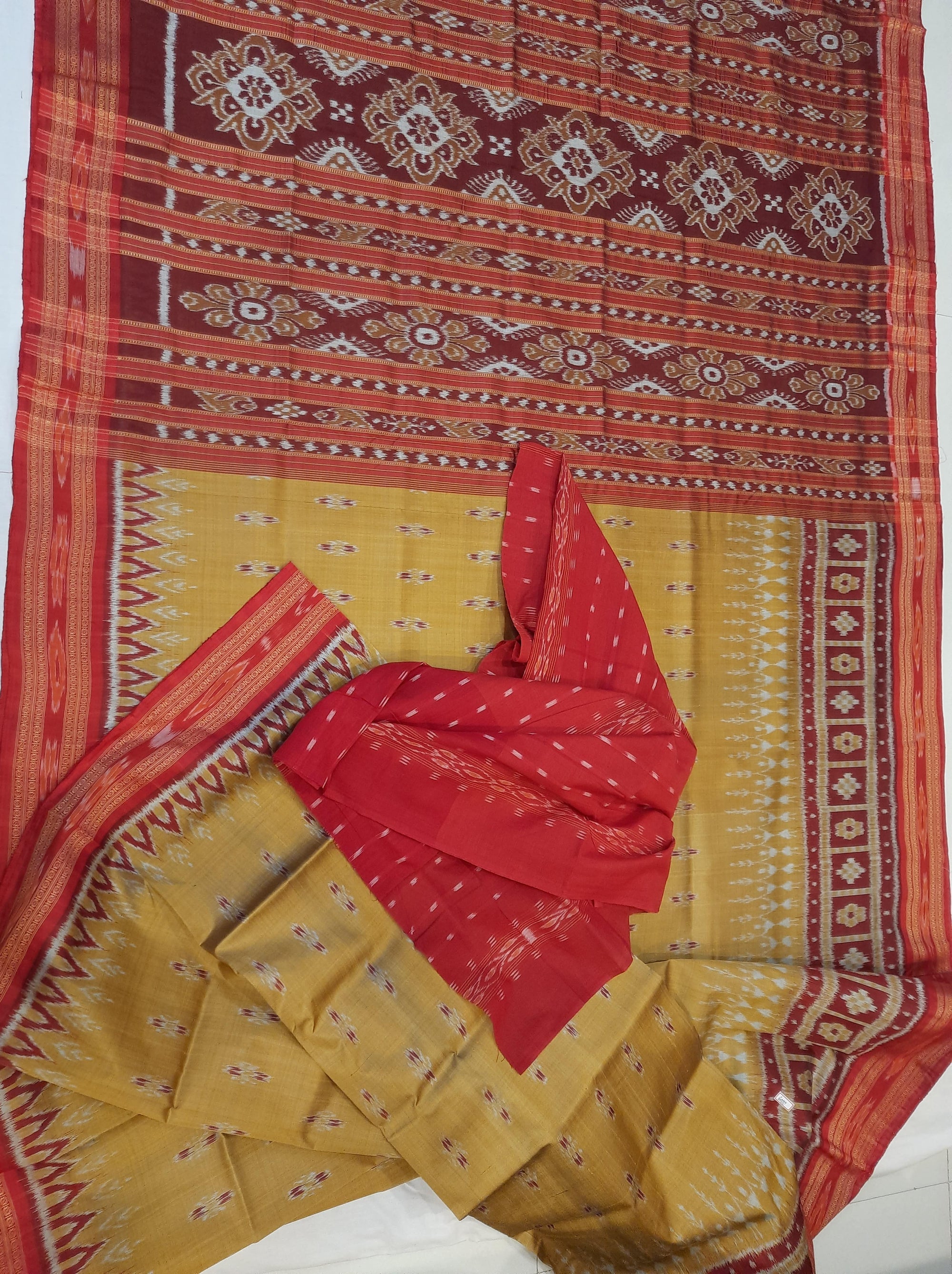 Golden wide border Odisha Khandua Pata Silk Saree paired with cotton ikat blouse piece