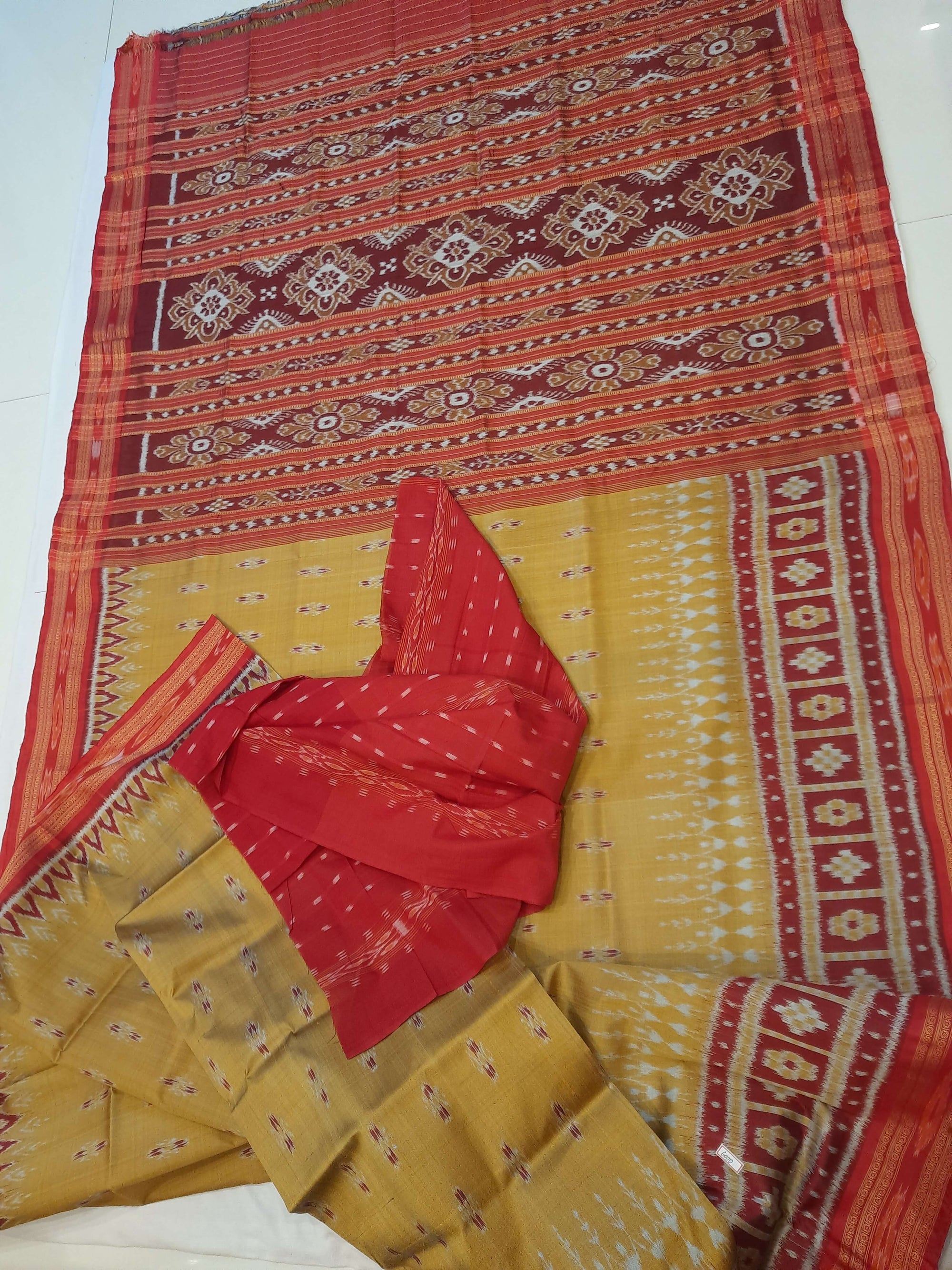 Golden wide border Odisha Khandua Pata Silk Saree paired with cotton ikat blouse piece