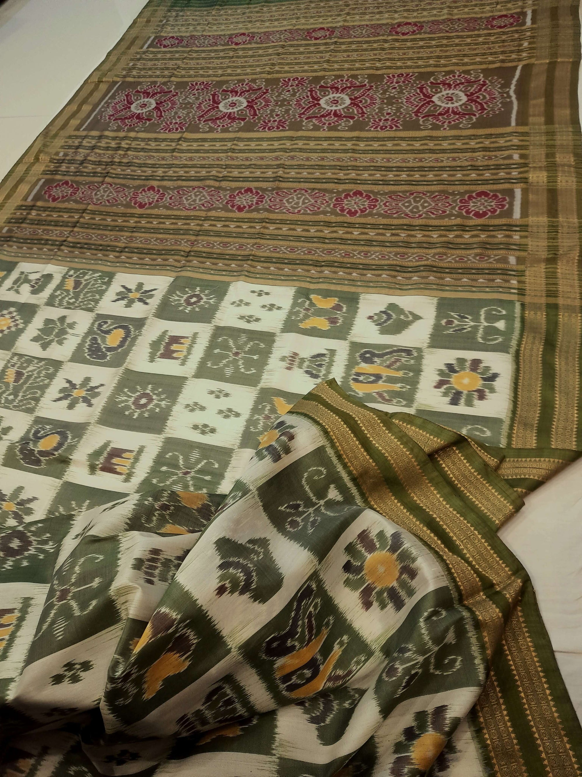 White with Green Odisha Khandua Pata Silk Saree paired with cotton ikat blouse piece