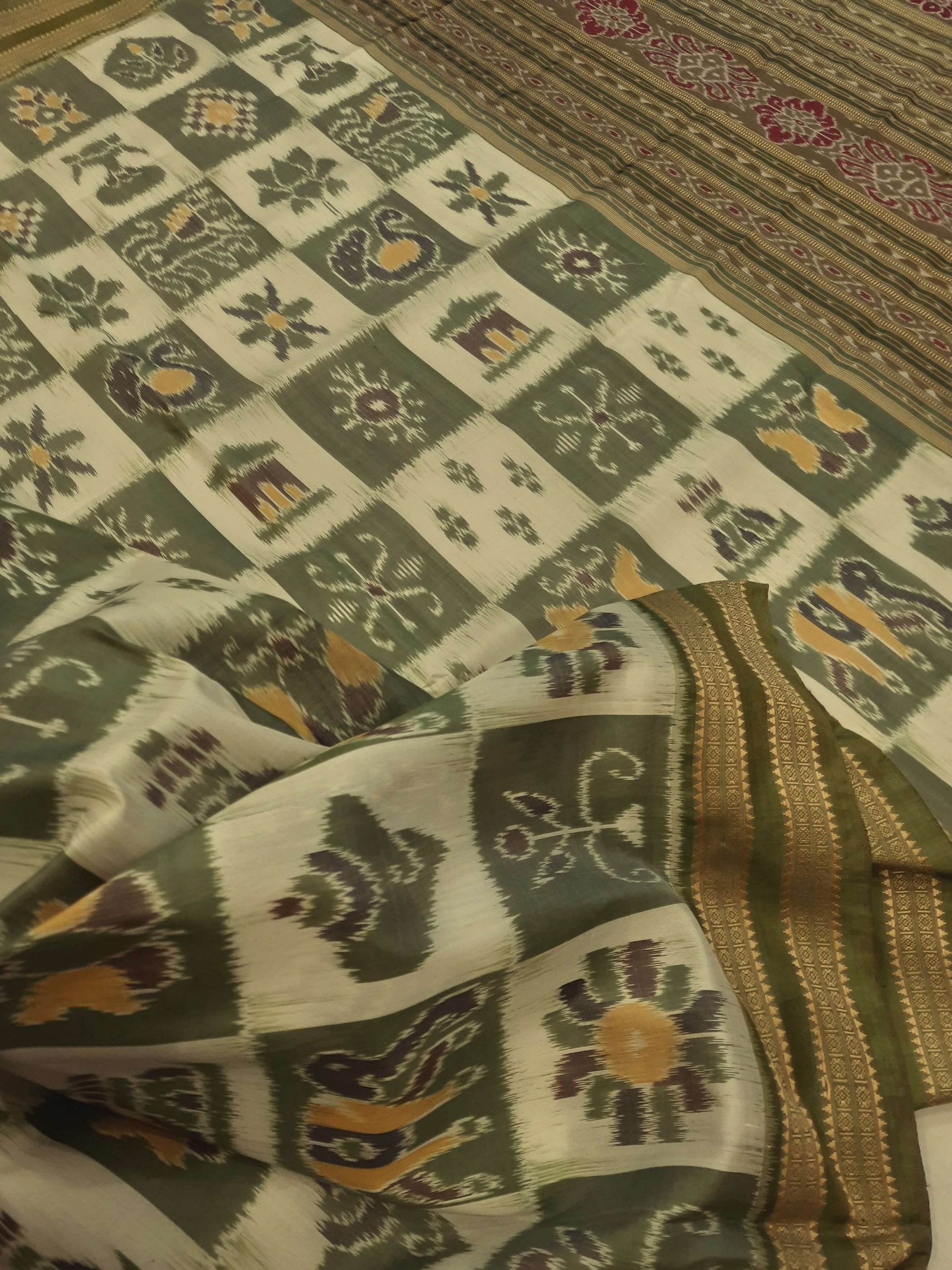 White with Green Odisha Khandua Pata Silk Saree paired with cotton ikat blouse piece