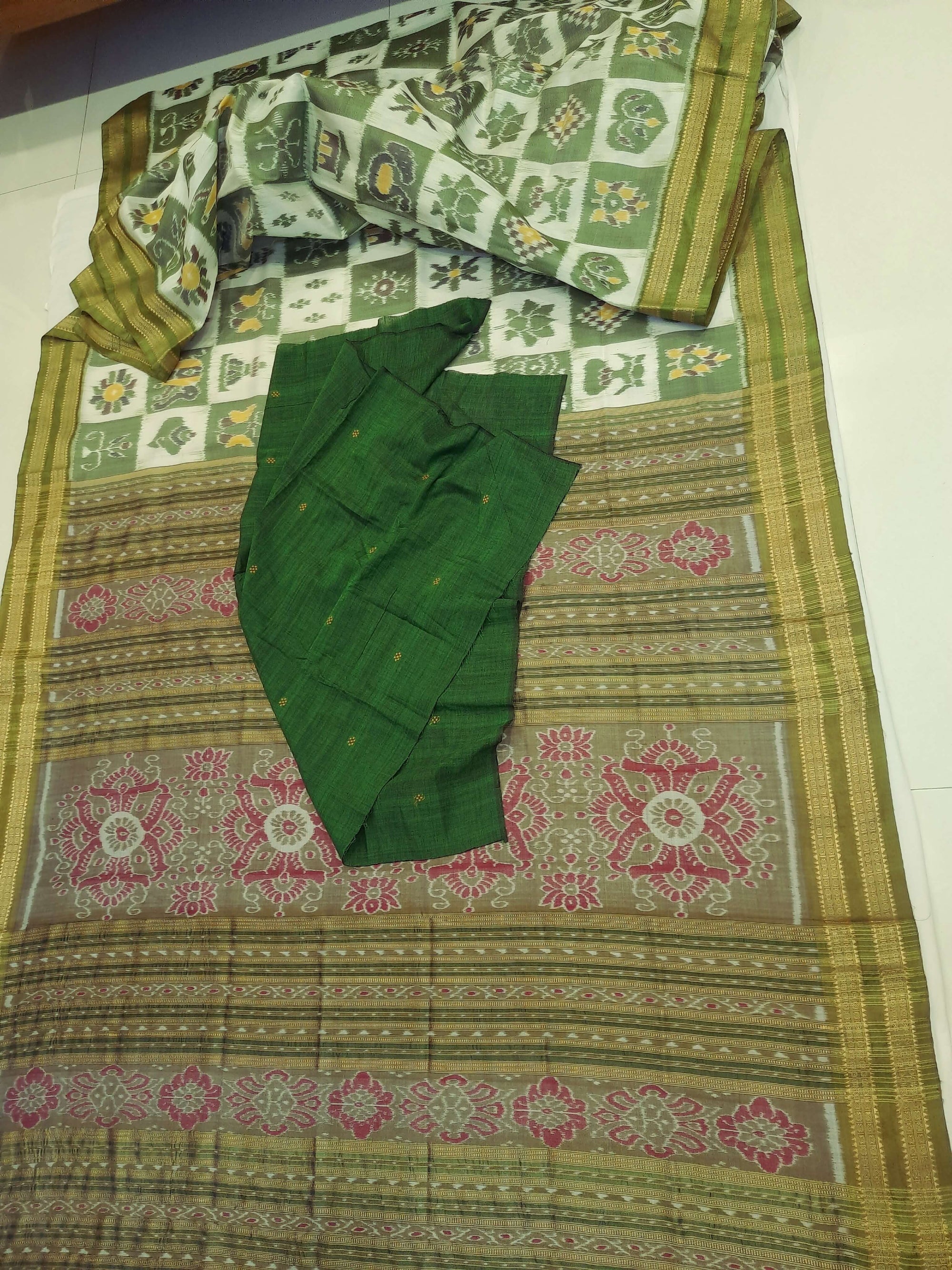 White with Green Odisha Khandua Pata Silk Saree paired with cotton ikat blouse piece