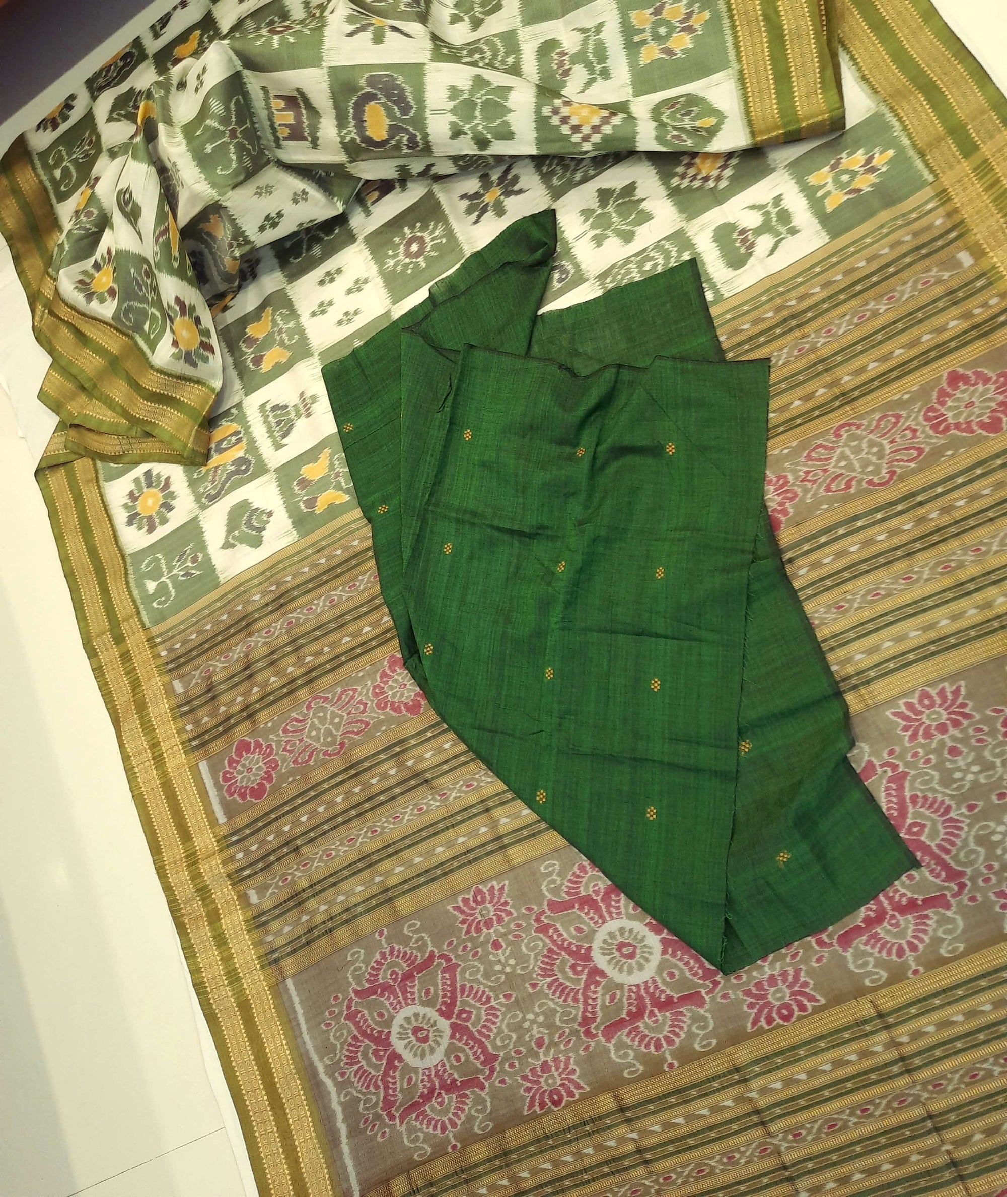 White with Green Odisha Khandua Pata Silk Saree paired with cotton ikat blouse piece