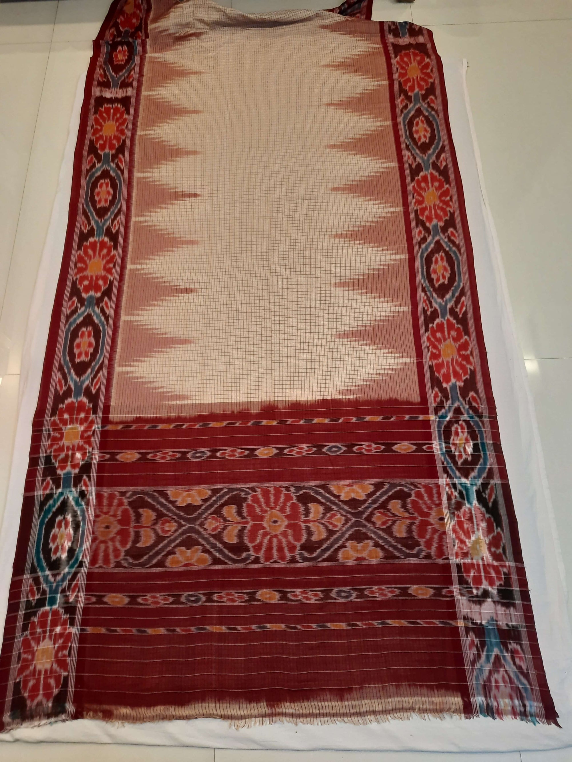 Beige checkered body Cotton Odisha Ikat saree with mix match cotton ikat blouse