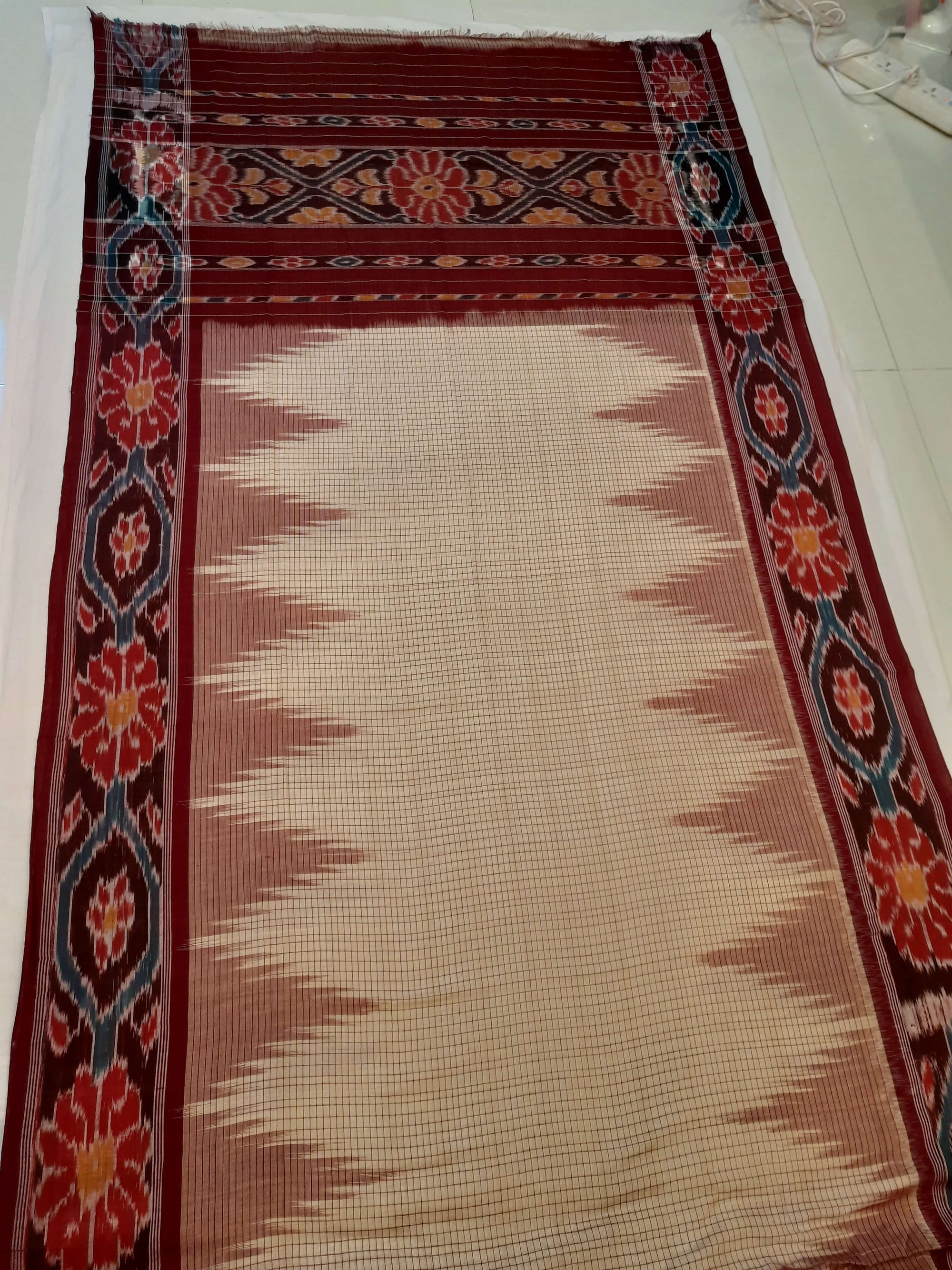 Beige checkered body Cotton Odisha Ikat saree with mix match cotton ikat blouse