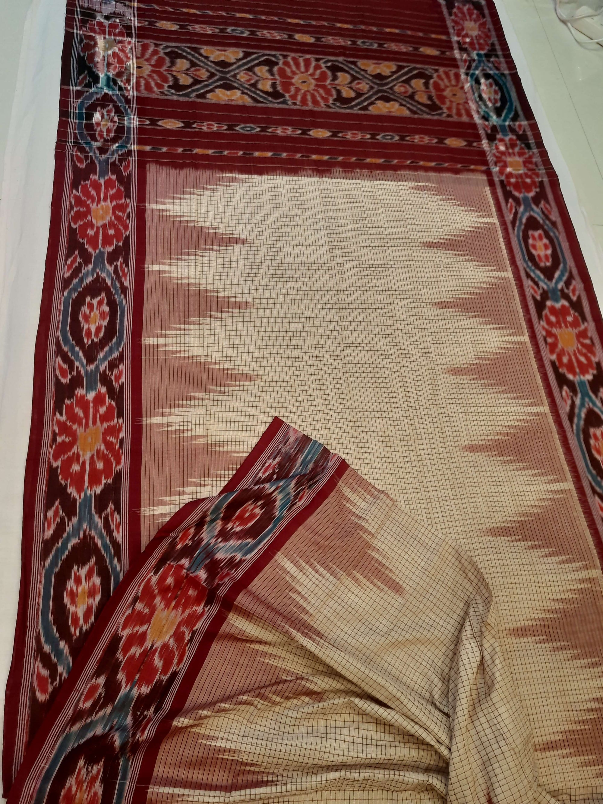 Beige checkered body Cotton Odisha Ikat saree with mix match cotton ikat blouse