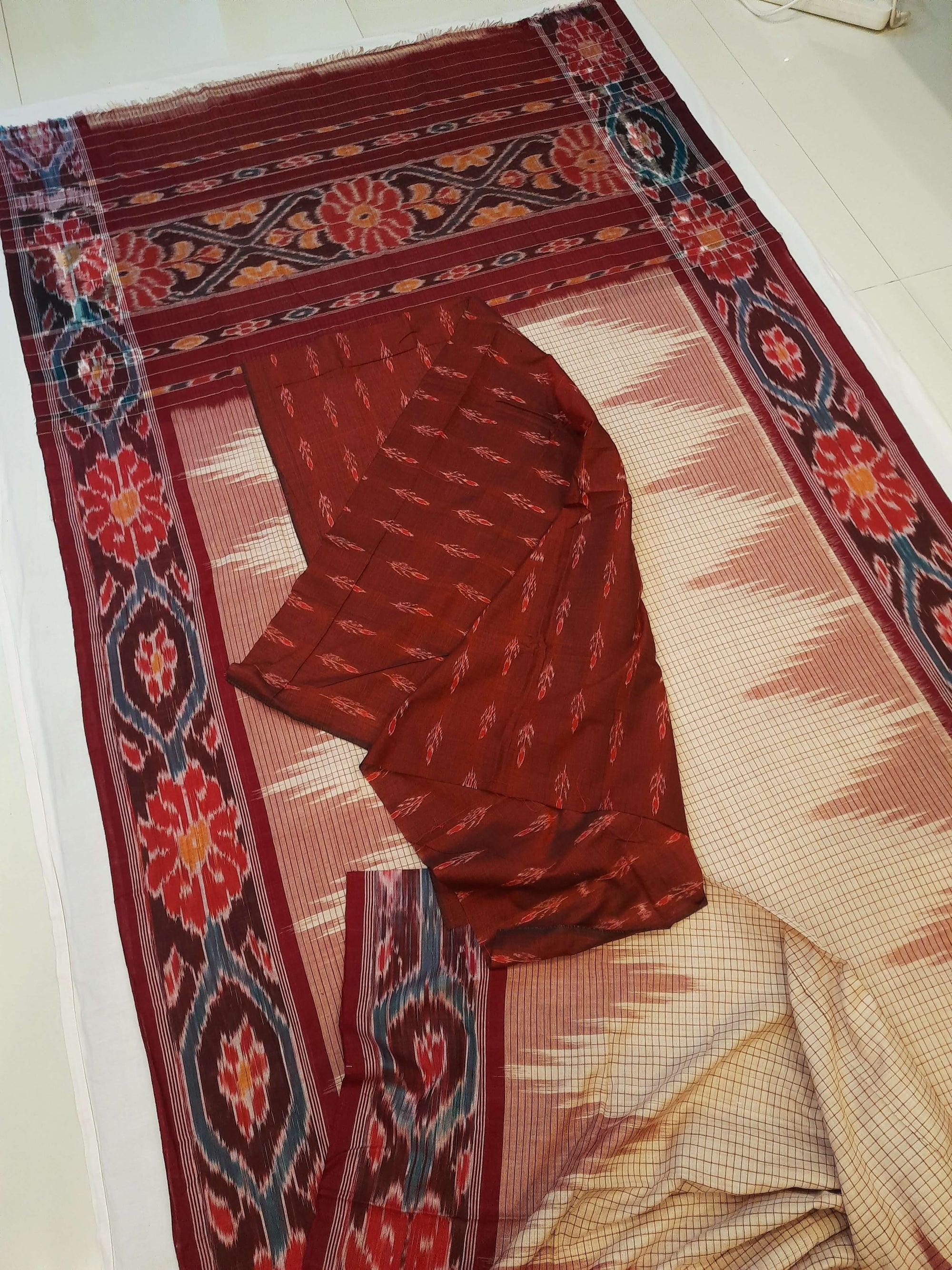 Beige checkered body Cotton Odisha Ikat saree with mix match cotton ikat blouse