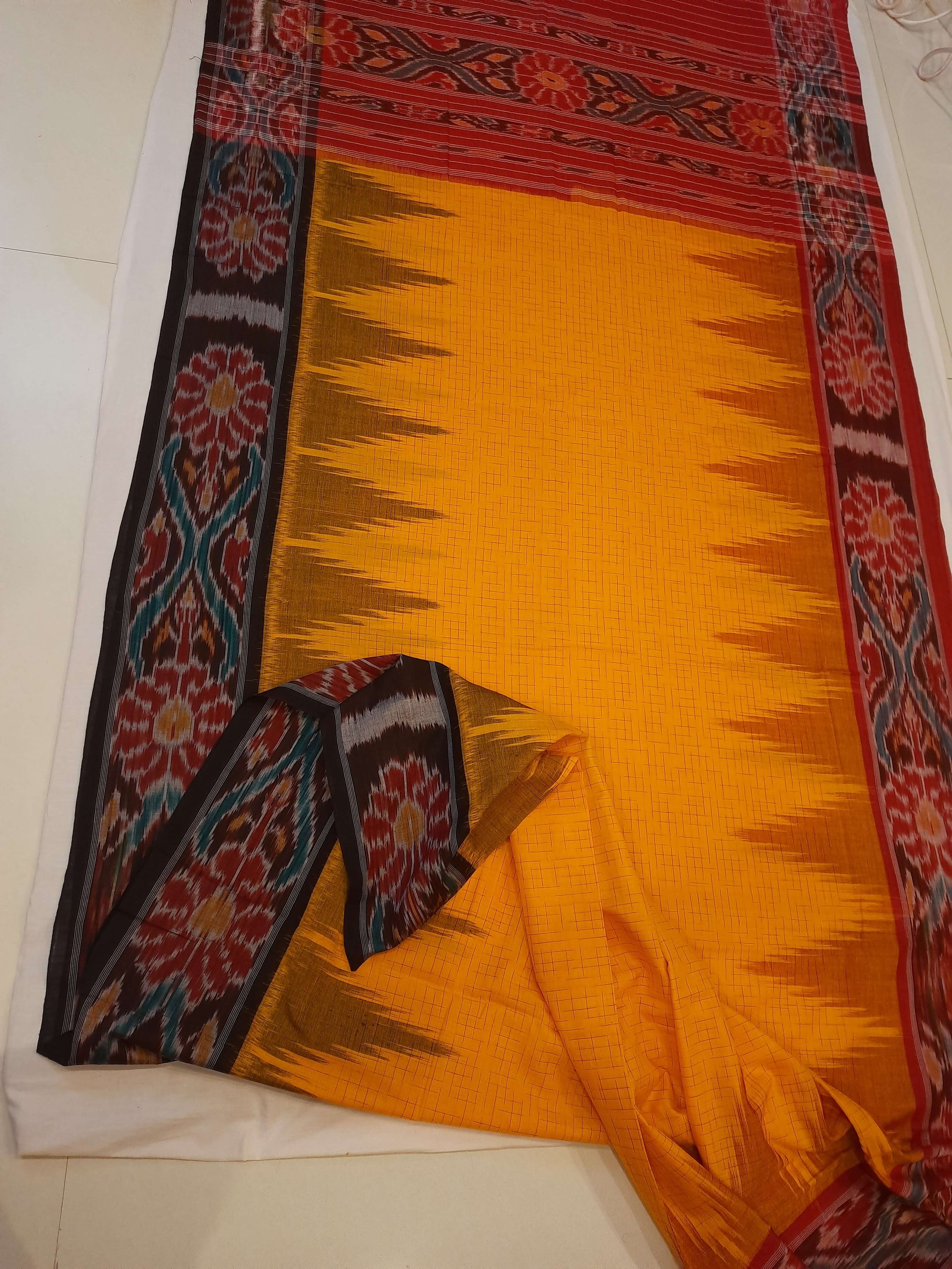 Yellow Gangajamuna border Cotton Odisha Ikat saree with mix match cotton ikat blouse