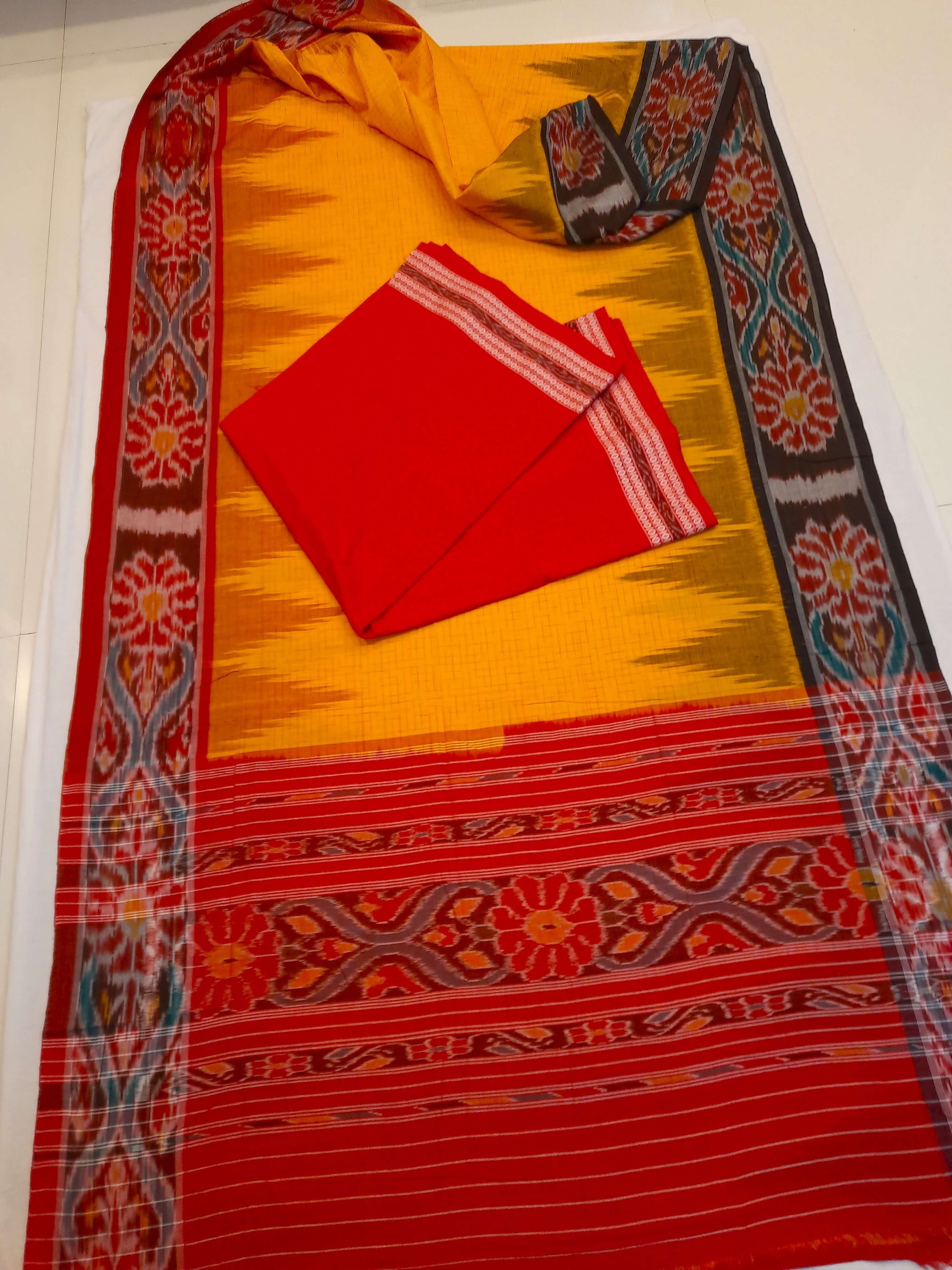 Yellow Gangajamuna border Cotton Odisha Ikat saree with mix match cotton ikat blouse