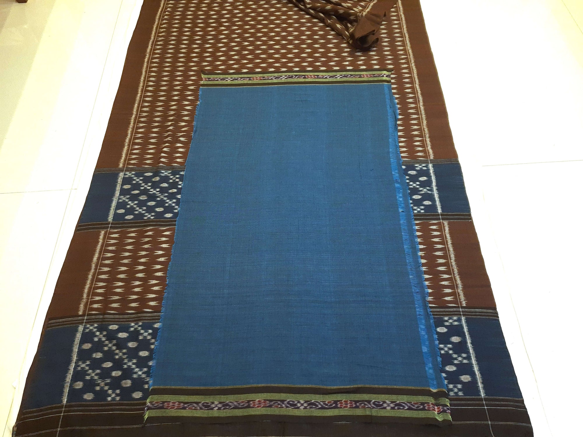 Brown Cotton Odisha Ikat saree with mix match cotton ikat blouse piece