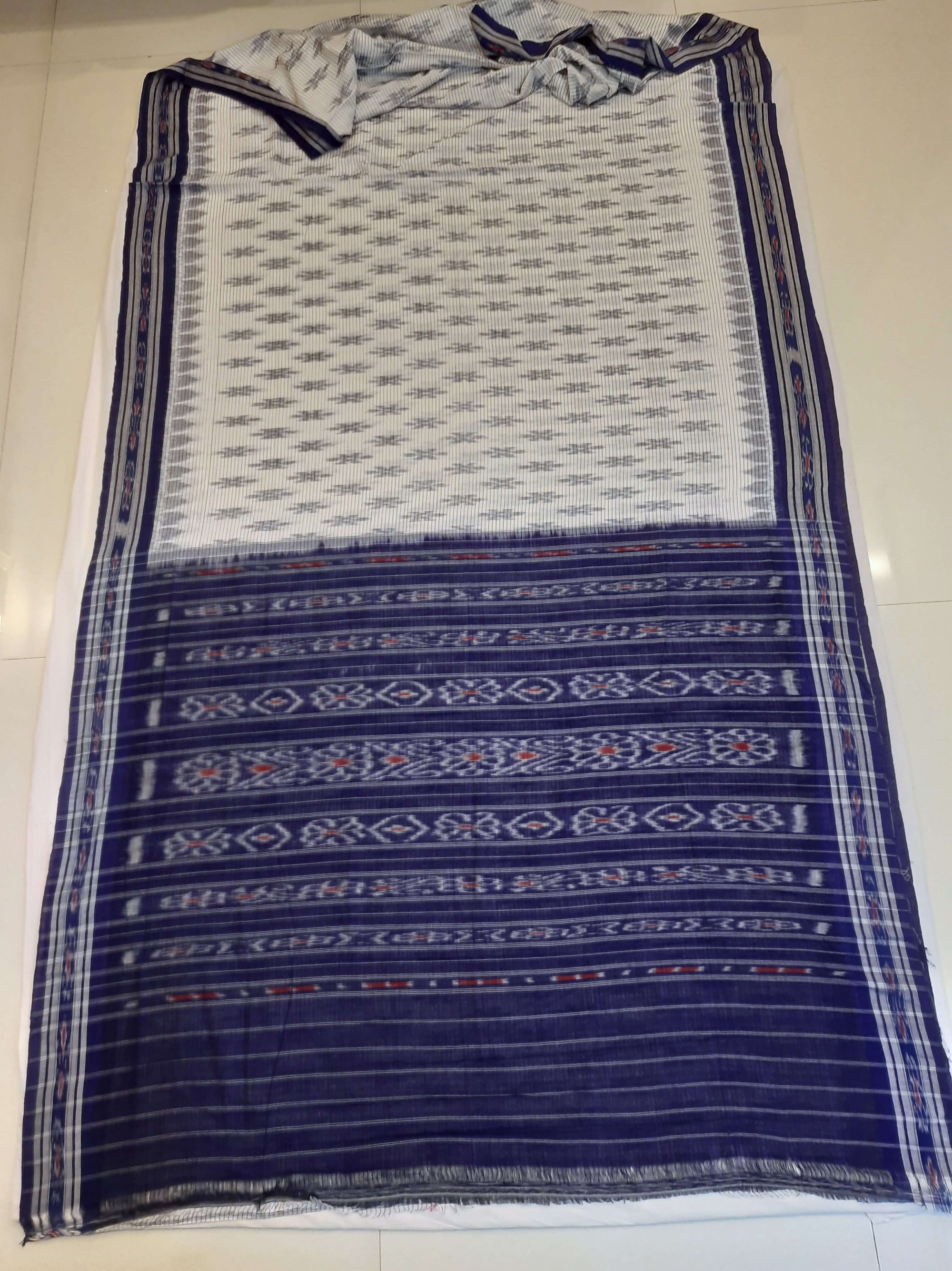 White with Blue Cotton Odisha Ikat saree with cotton ikat blouse piece