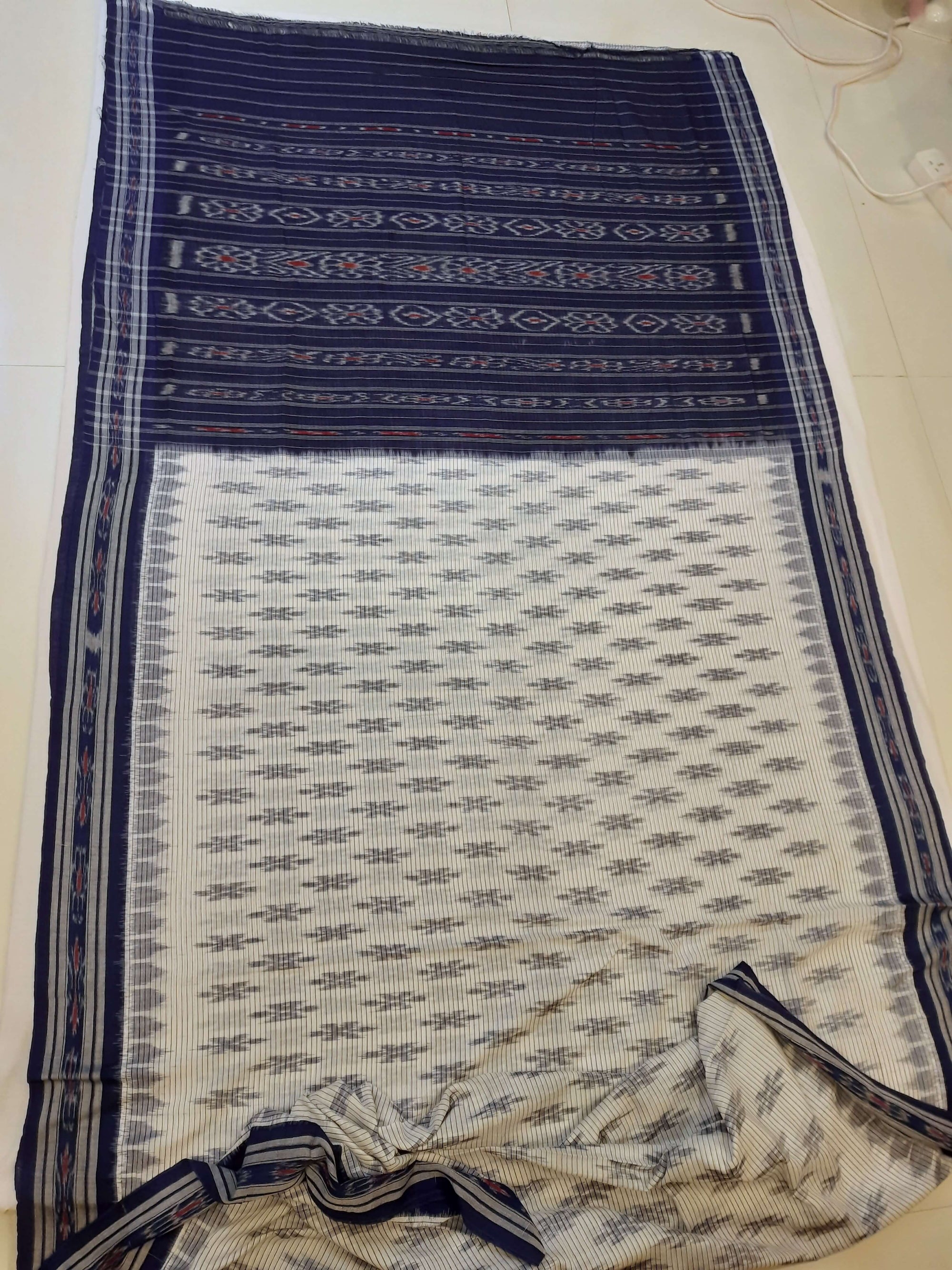 White with Blue Cotton Odisha Ikat saree with cotton ikat blouse piece
