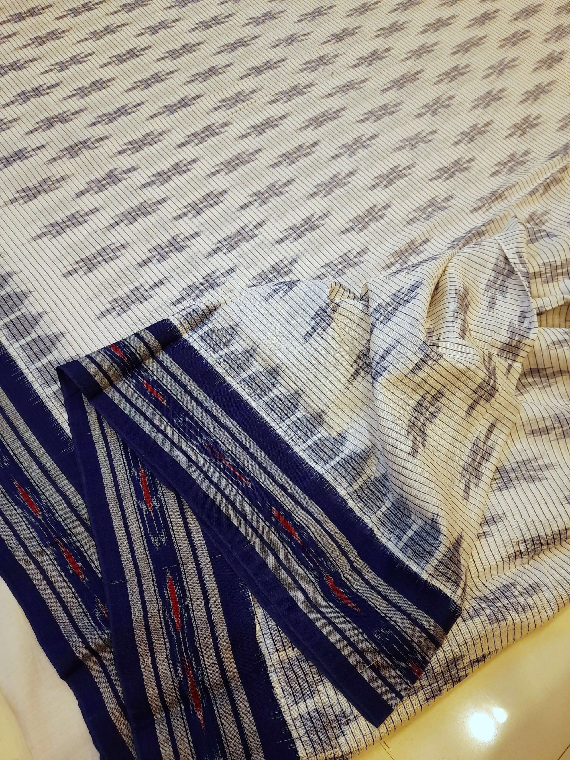 White with Blue Cotton Odisha Ikat saree with cotton ikat blouse piece