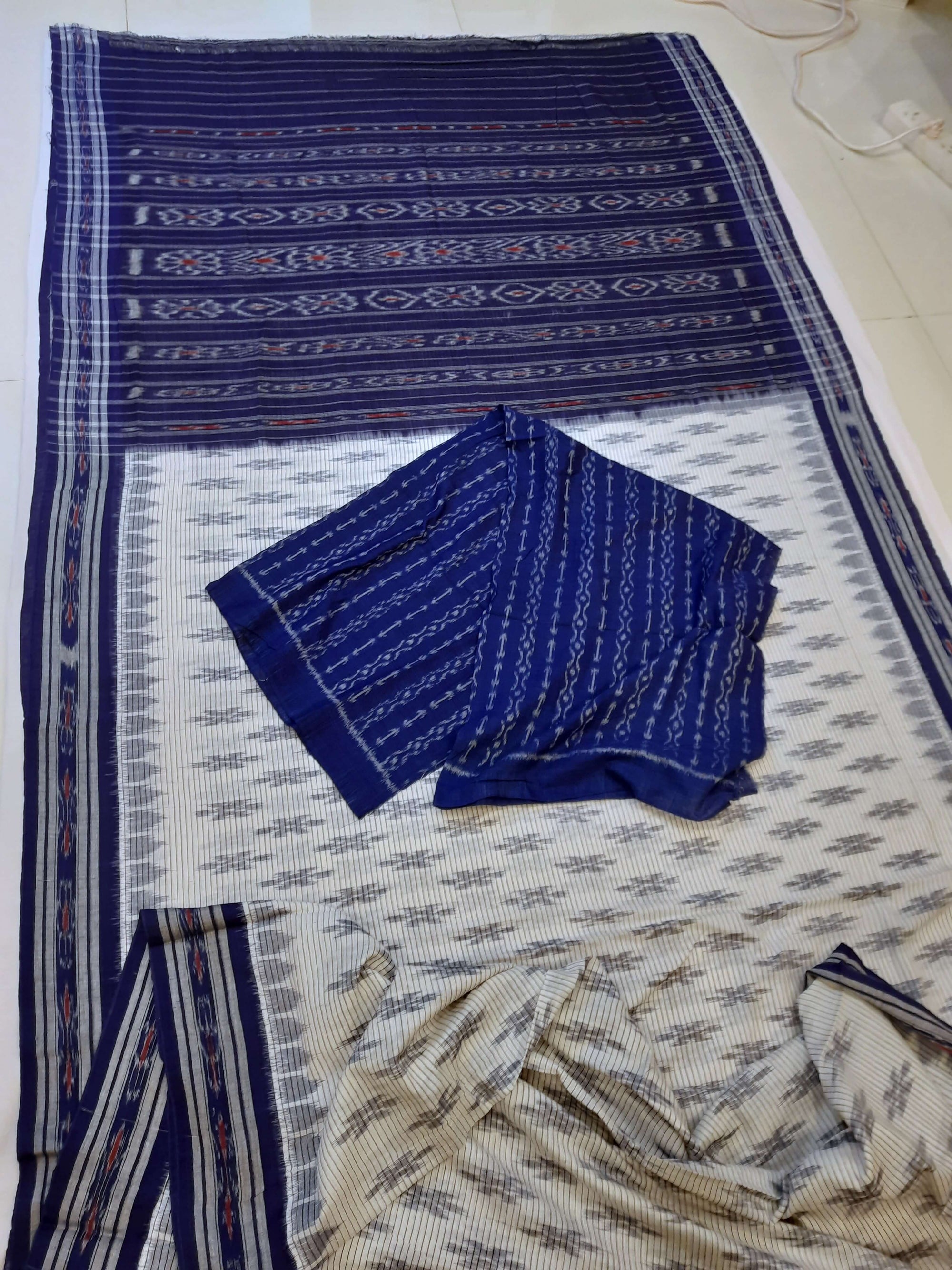 White with Blue Cotton Odisha Ikat saree with cotton ikat blouse piece