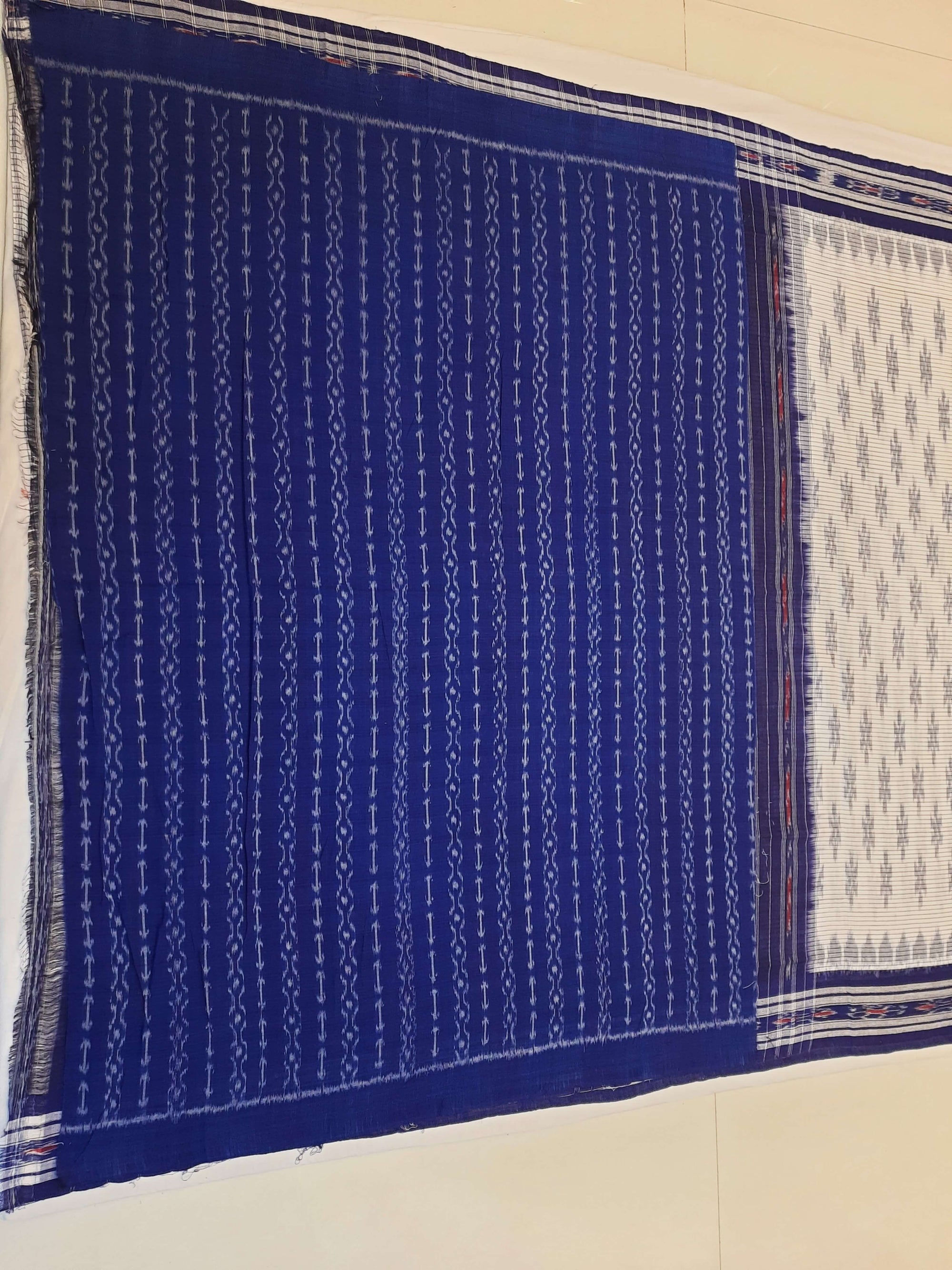 White with Blue Cotton Odisha Ikat saree with cotton ikat blouse piece