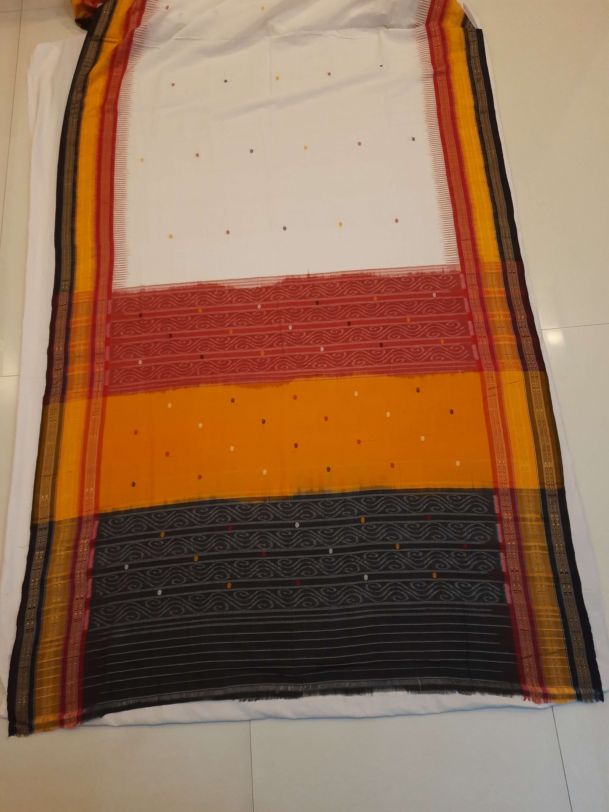 White Kathiphera Odisha Ikat saree with cotton ikat blouse piece