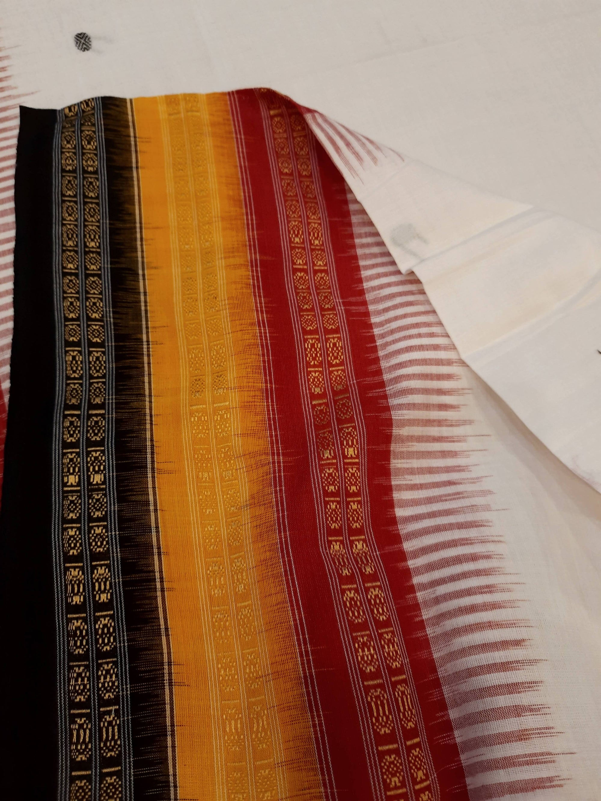 White Kathiphera Odisha Ikat saree with cotton ikat blouse piece