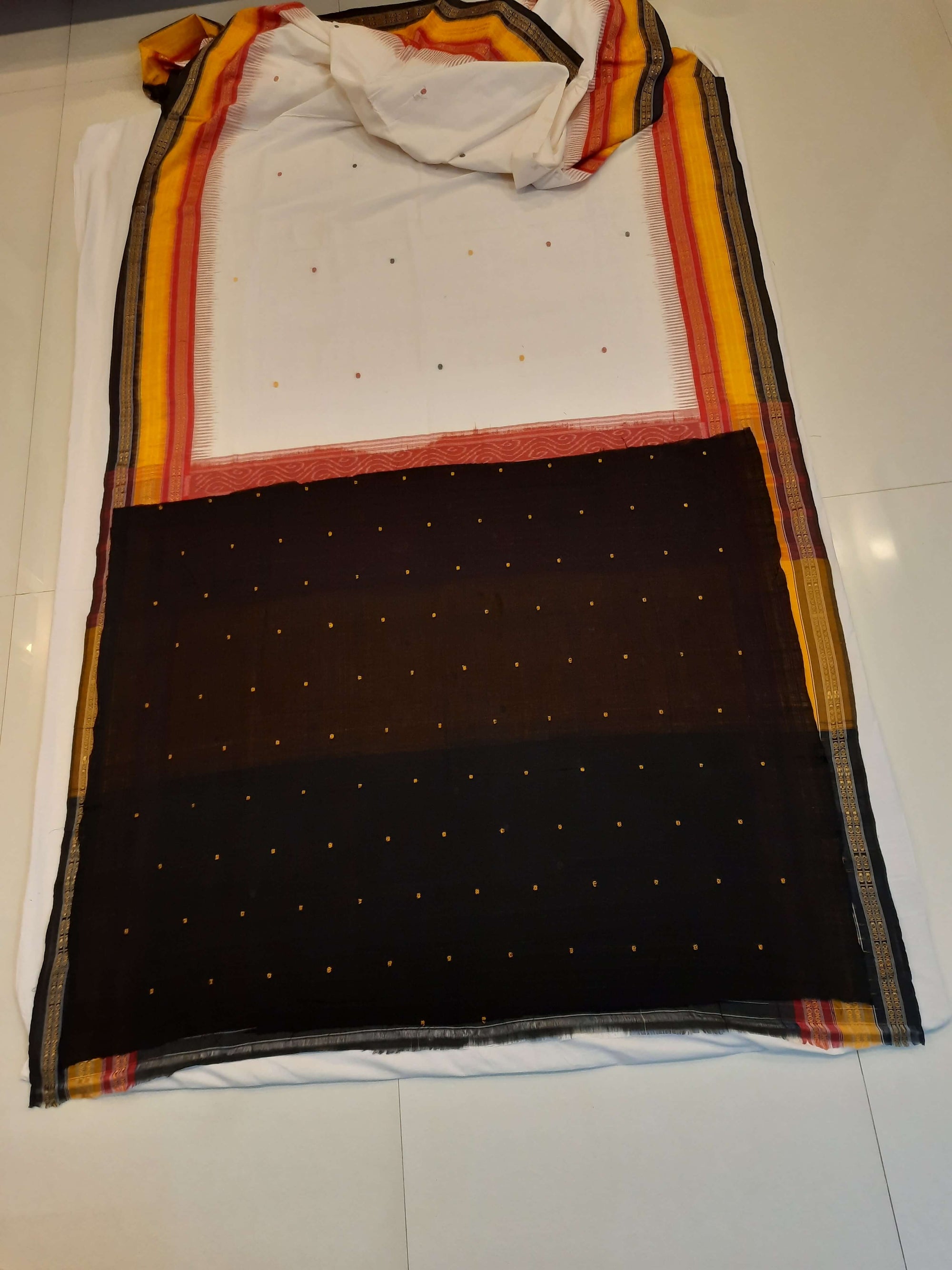 White Kathiphera Odisha Ikat saree with cotton ikat blouse piece