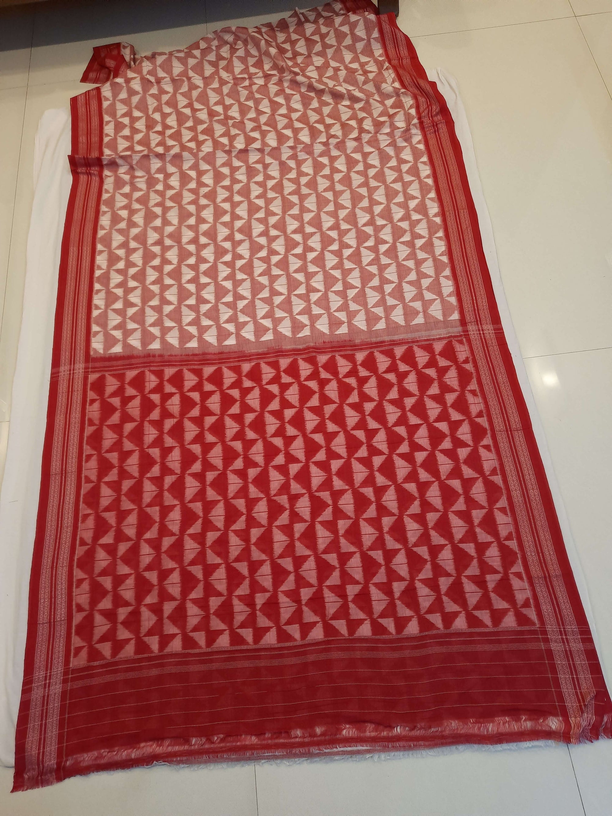 White Red Odisha Ikat saree with cotton ikat blouse piece