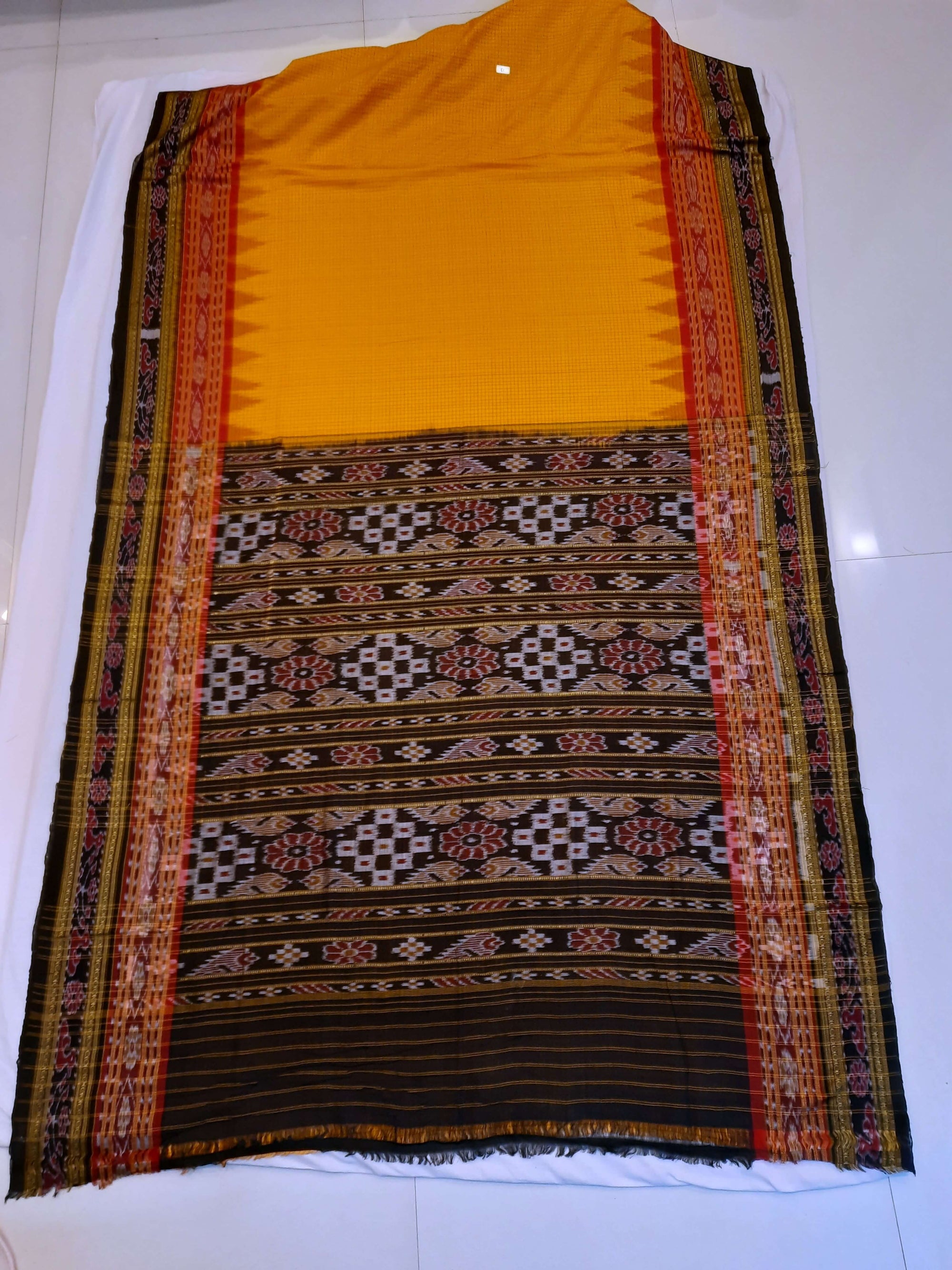 Yellow double order Sachipar Nuapatna Cotton Ikat saree with cotton ikat blouse piece