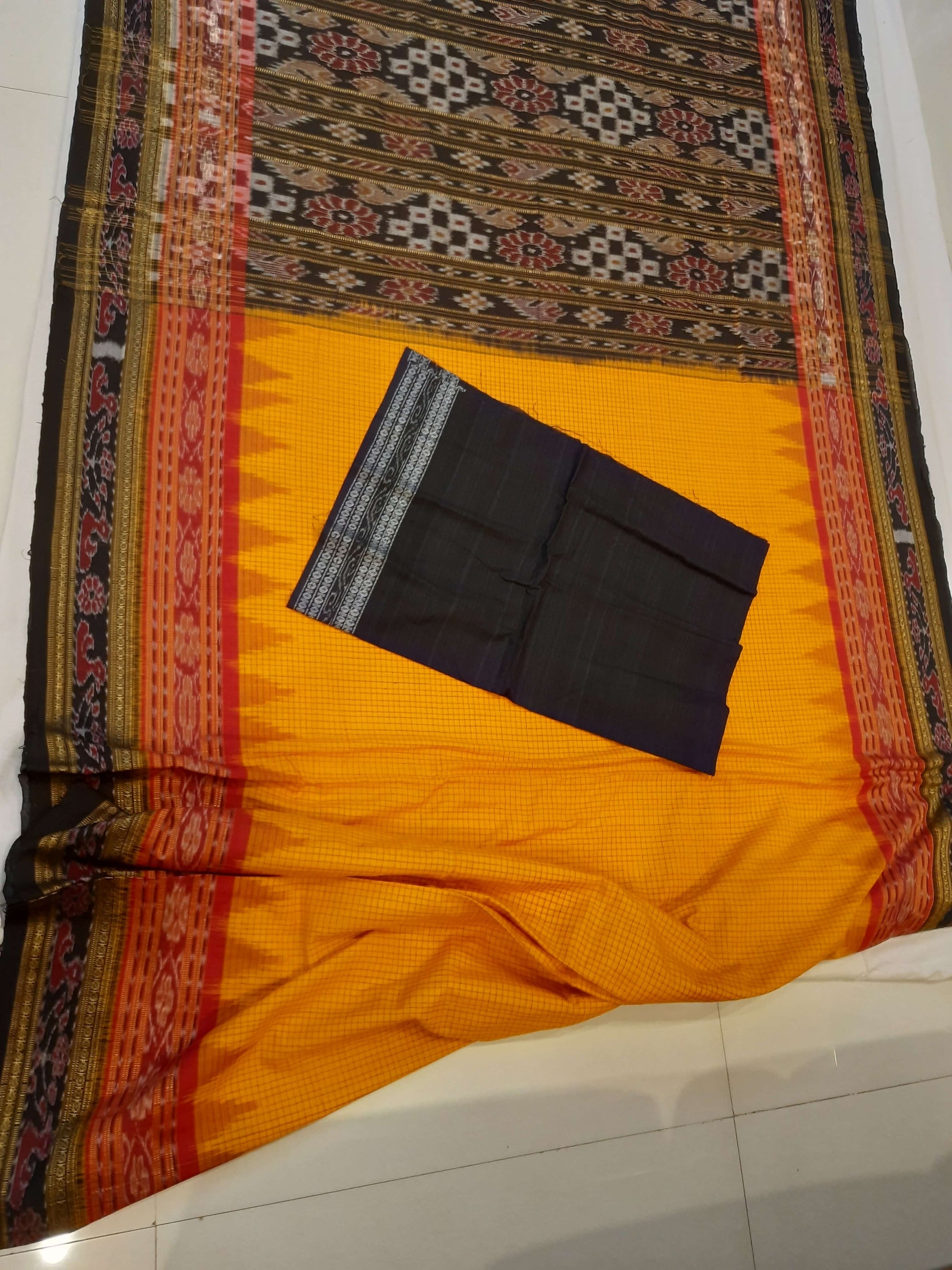 Yellow double order Sachipar Nuapatna Cotton Ikat saree with cotton ikat blouse piece