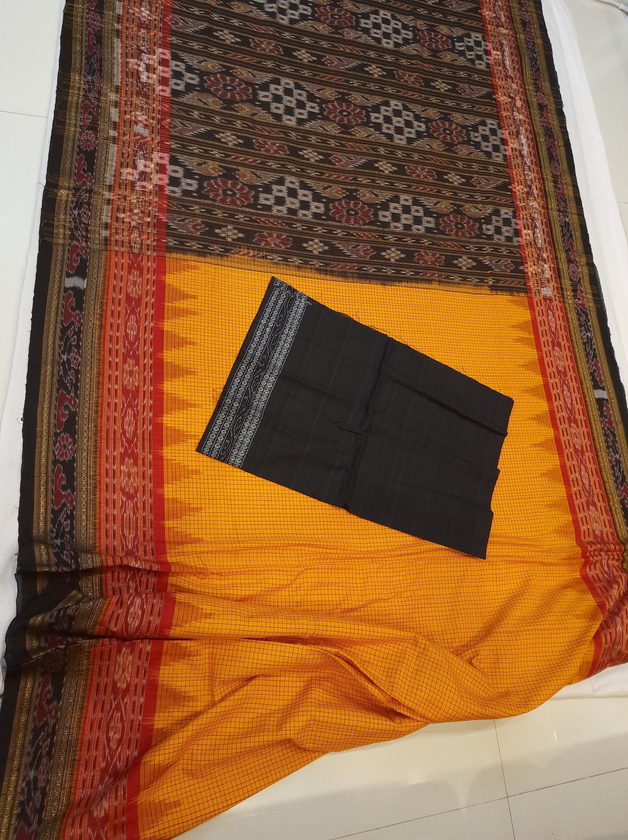 Yellow double order Sachipar Nuapatna Cotton Ikat saree with cotton ikat blouse piece
