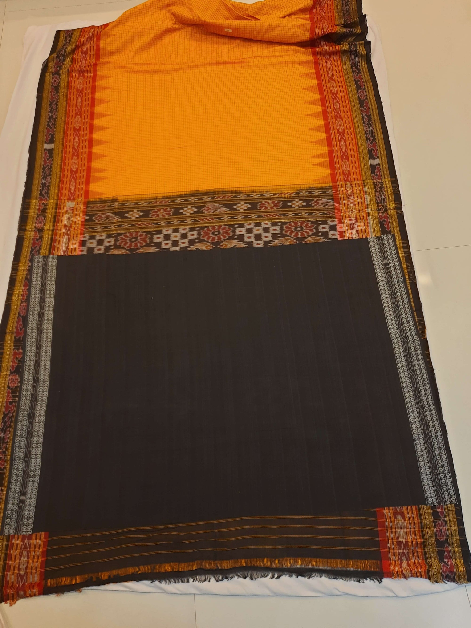 Yellow double order Sachipar Nuapatna Cotton Ikat saree with cotton ikat blouse piece