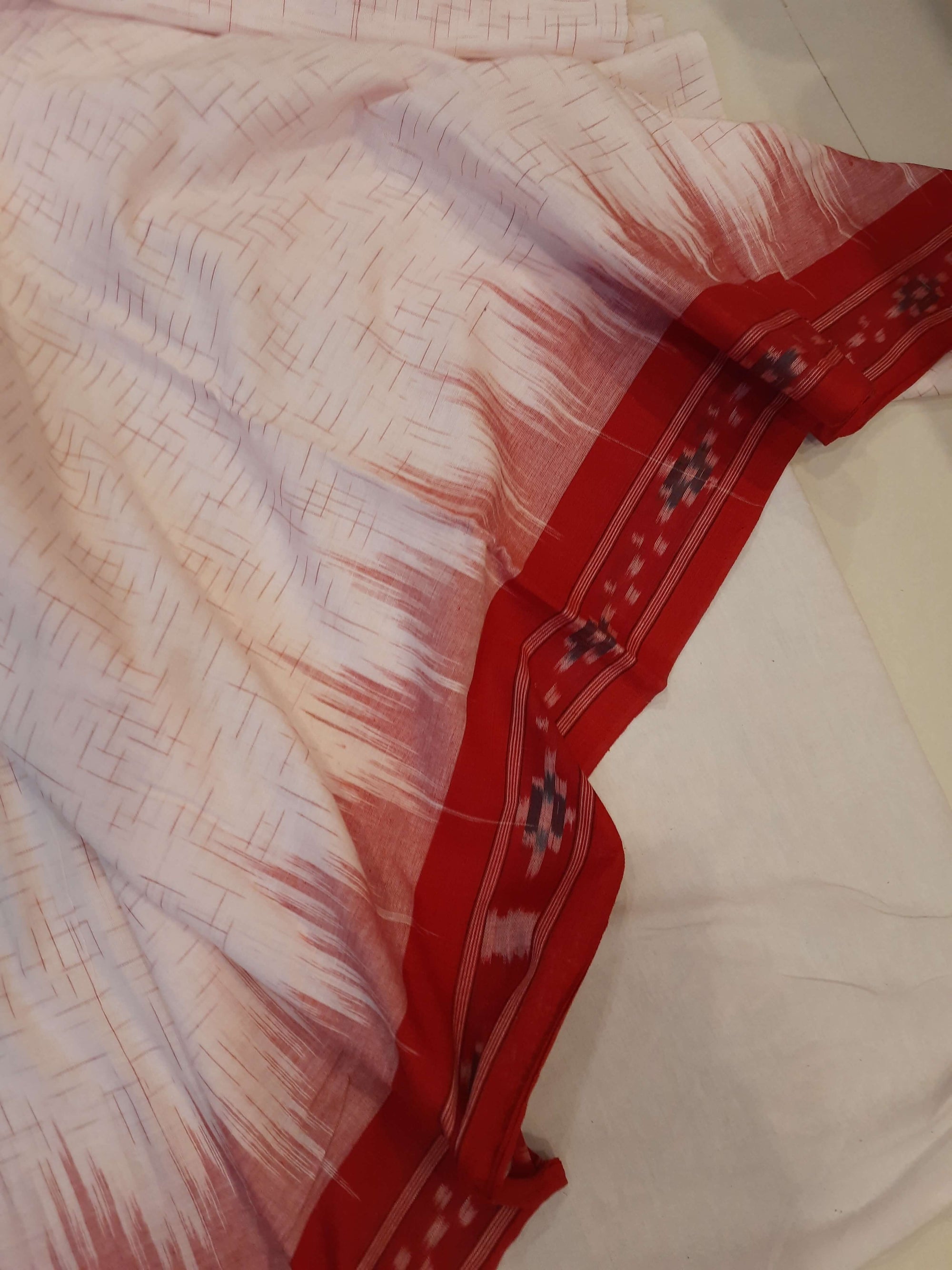 White with Red Cotton Odisha Ikat saree with mix match cotton ikat blouse piece