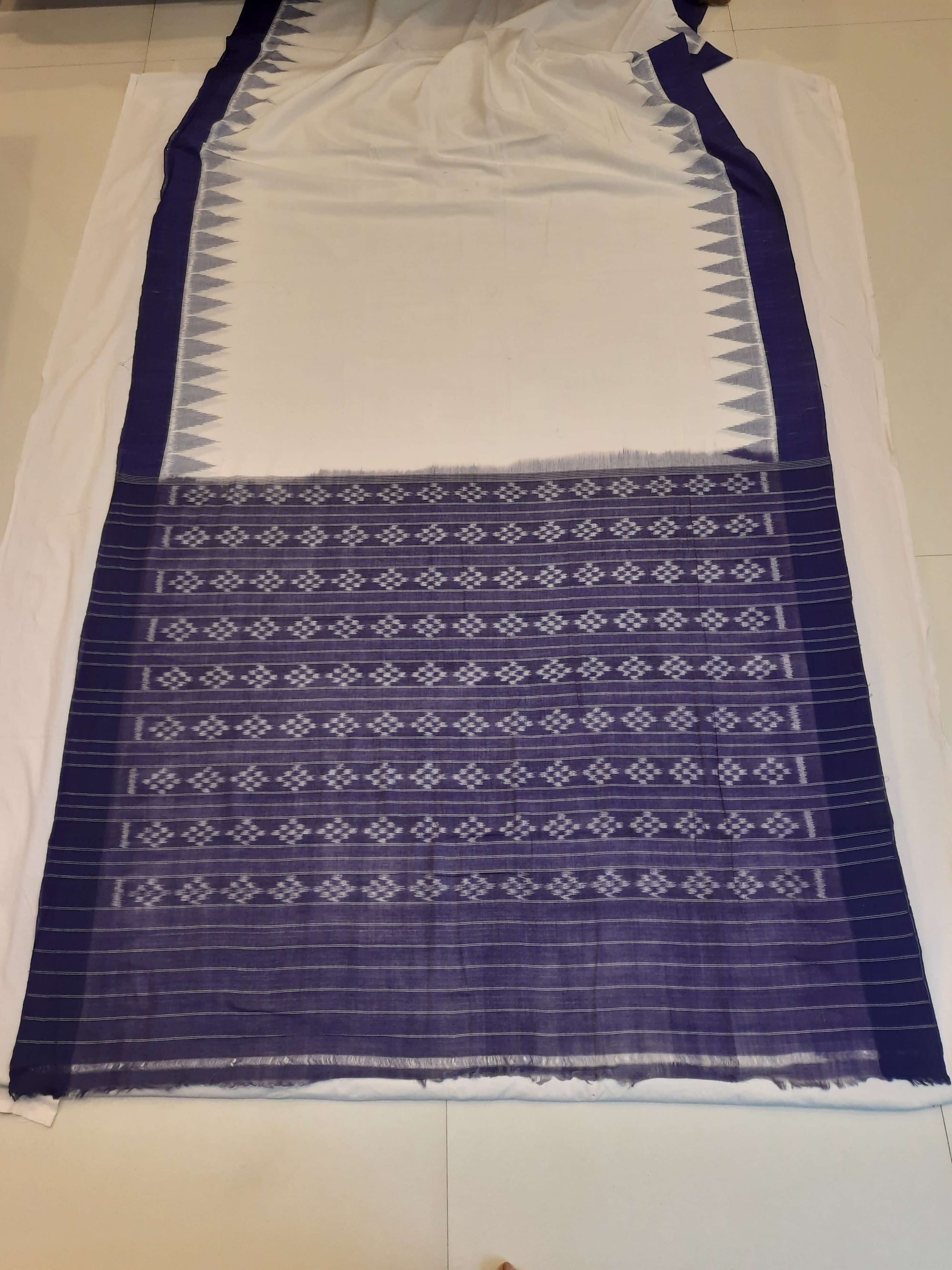 White and Blue Odisha Ikat saree with cotton ikat blouse piece