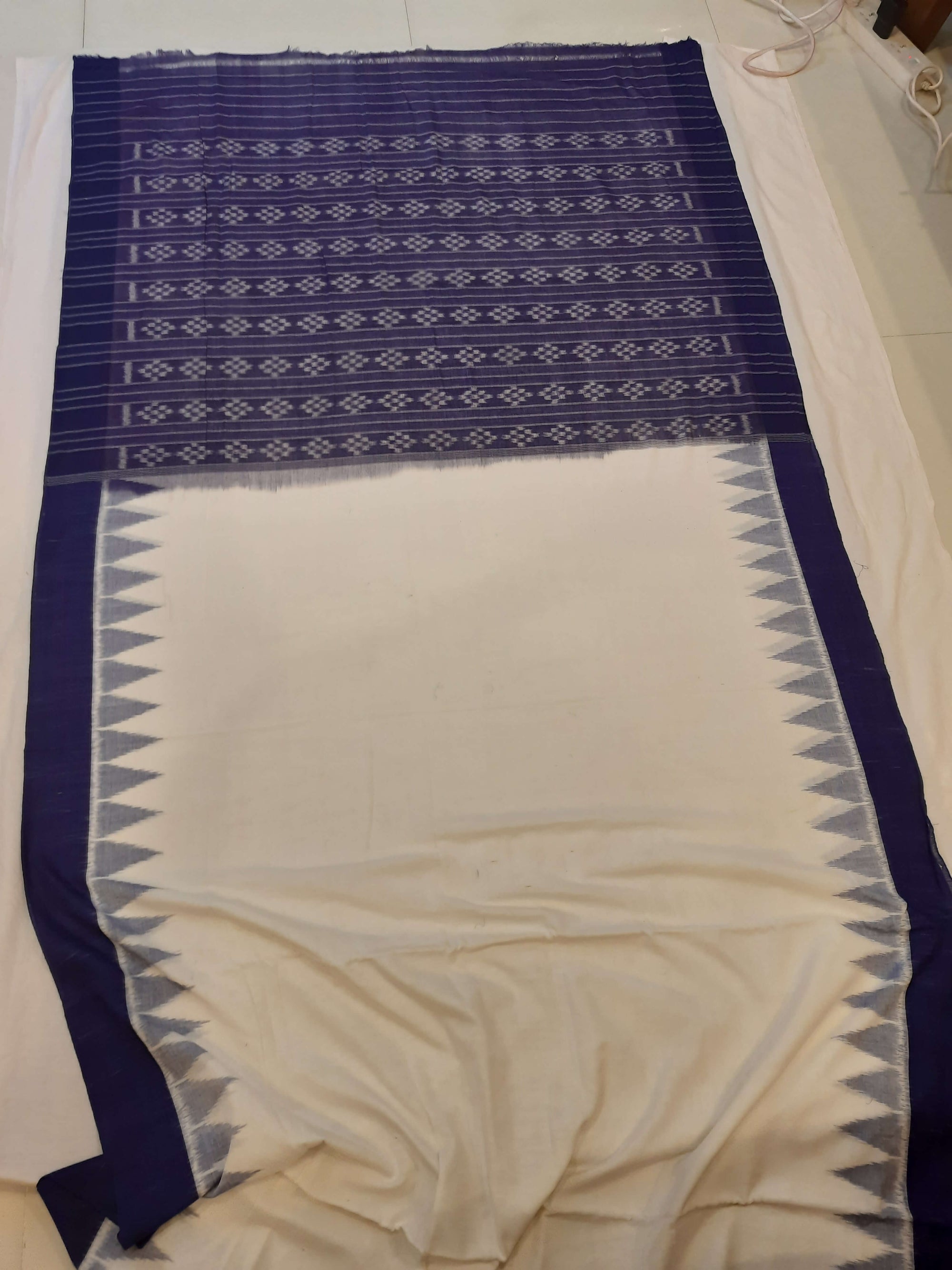 White and Blue Odisha Ikat saree with cotton ikat blouse piece