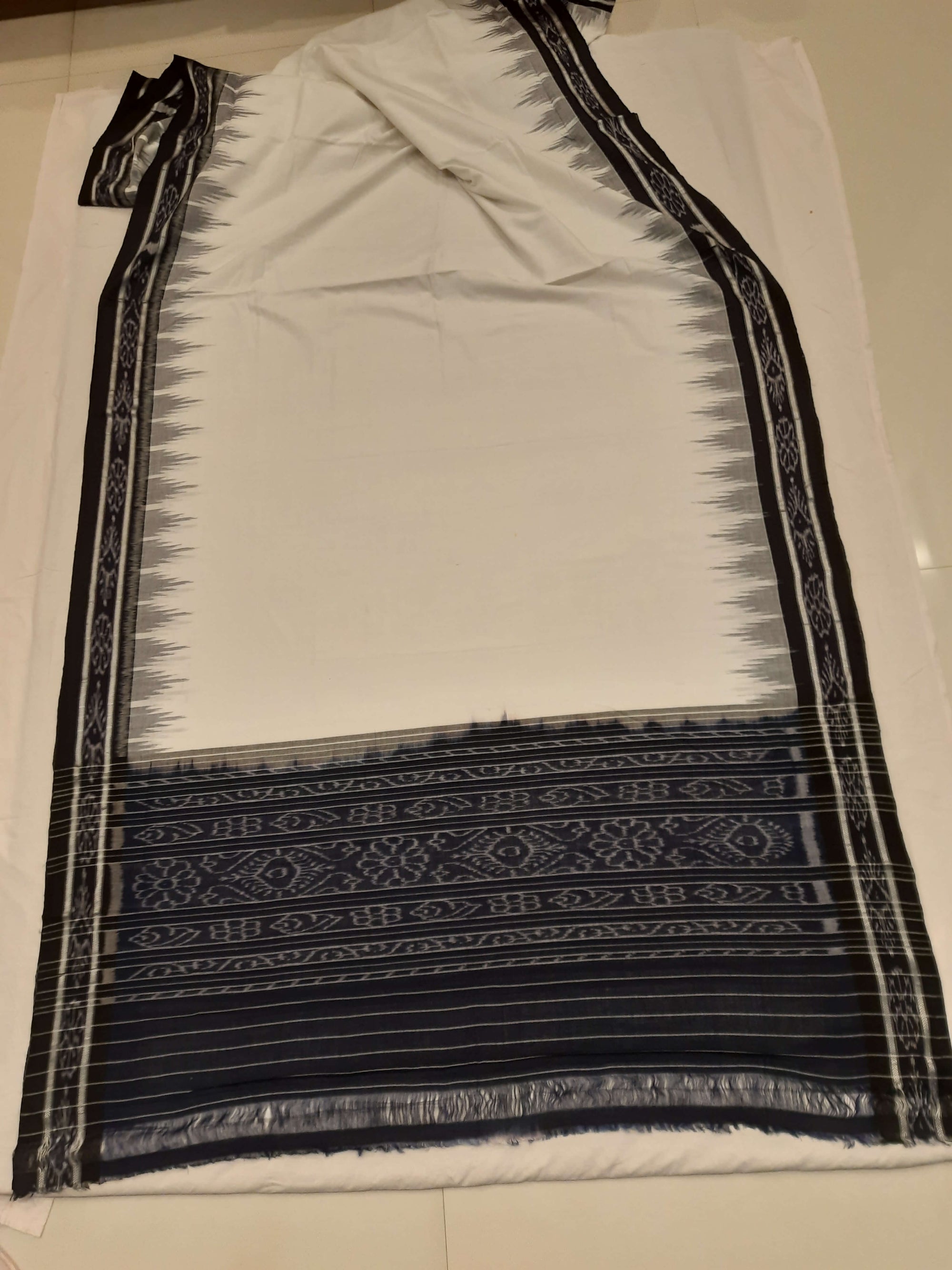 White and Black Odisha Ikat saree with cotton ikat blouse piece