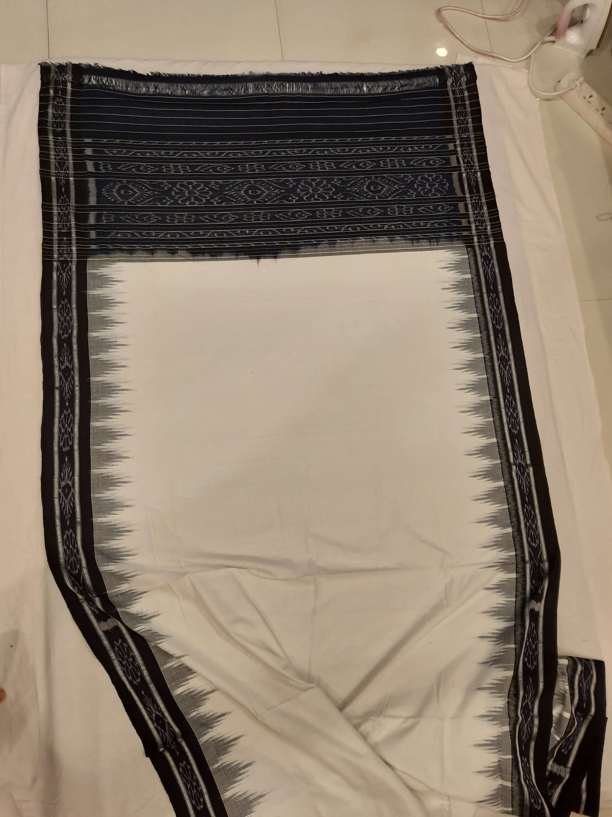 White and Black Odisha Ikat saree with cotton ikat blouse piece