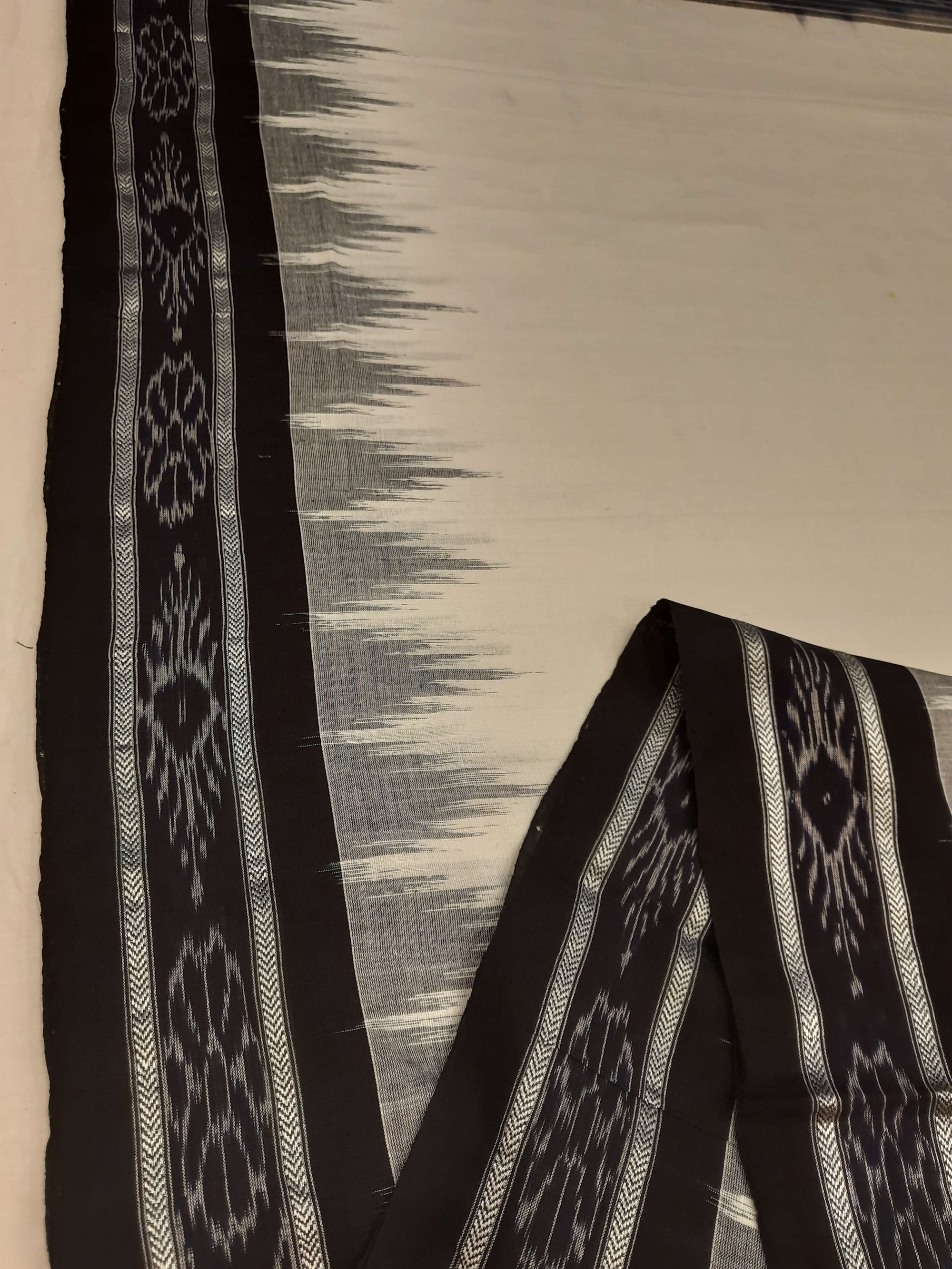 White and Black Odisha Ikat saree with cotton ikat blouse piece
