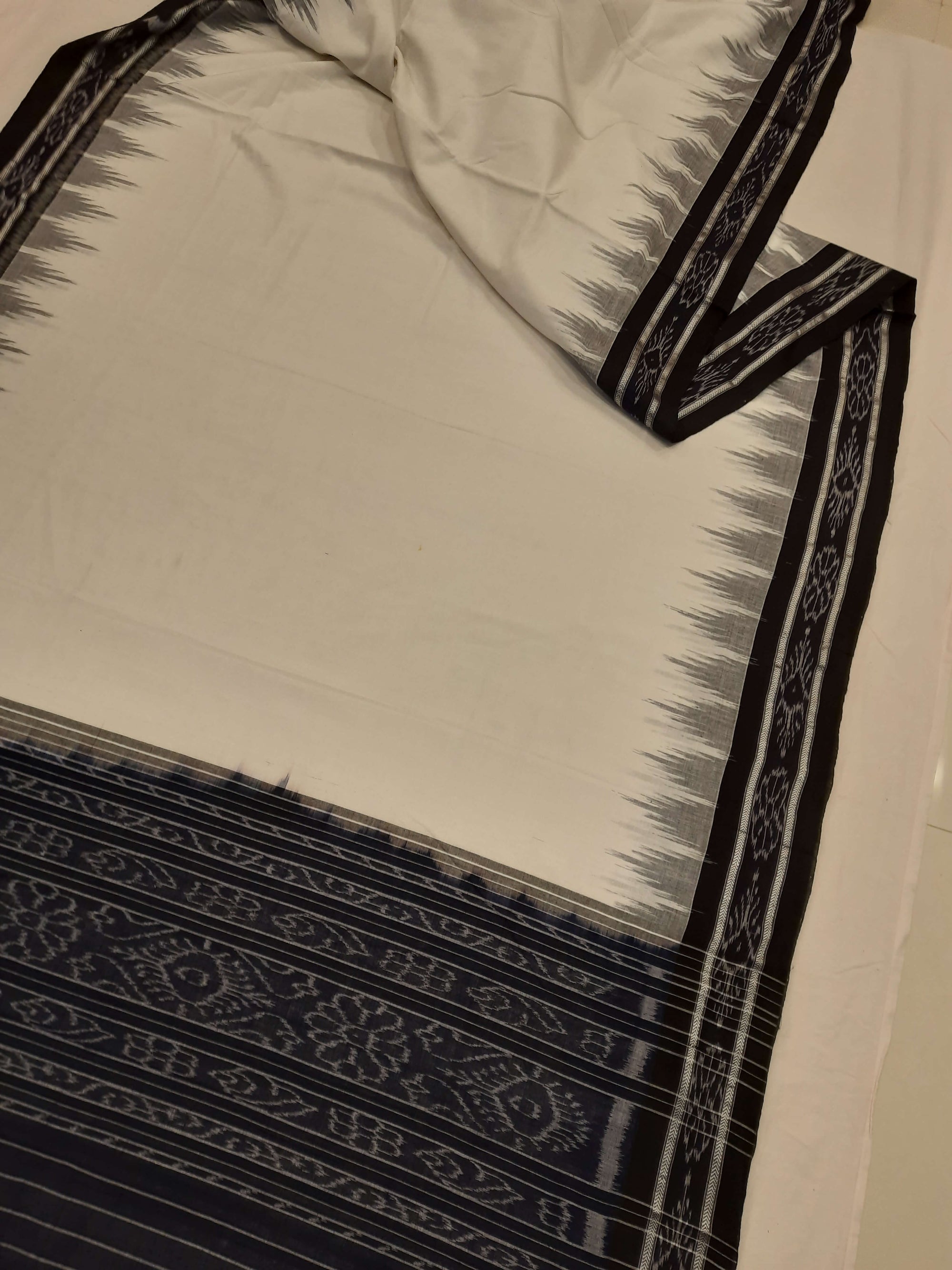 White and Black Odisha Ikat saree with cotton ikat blouse piece