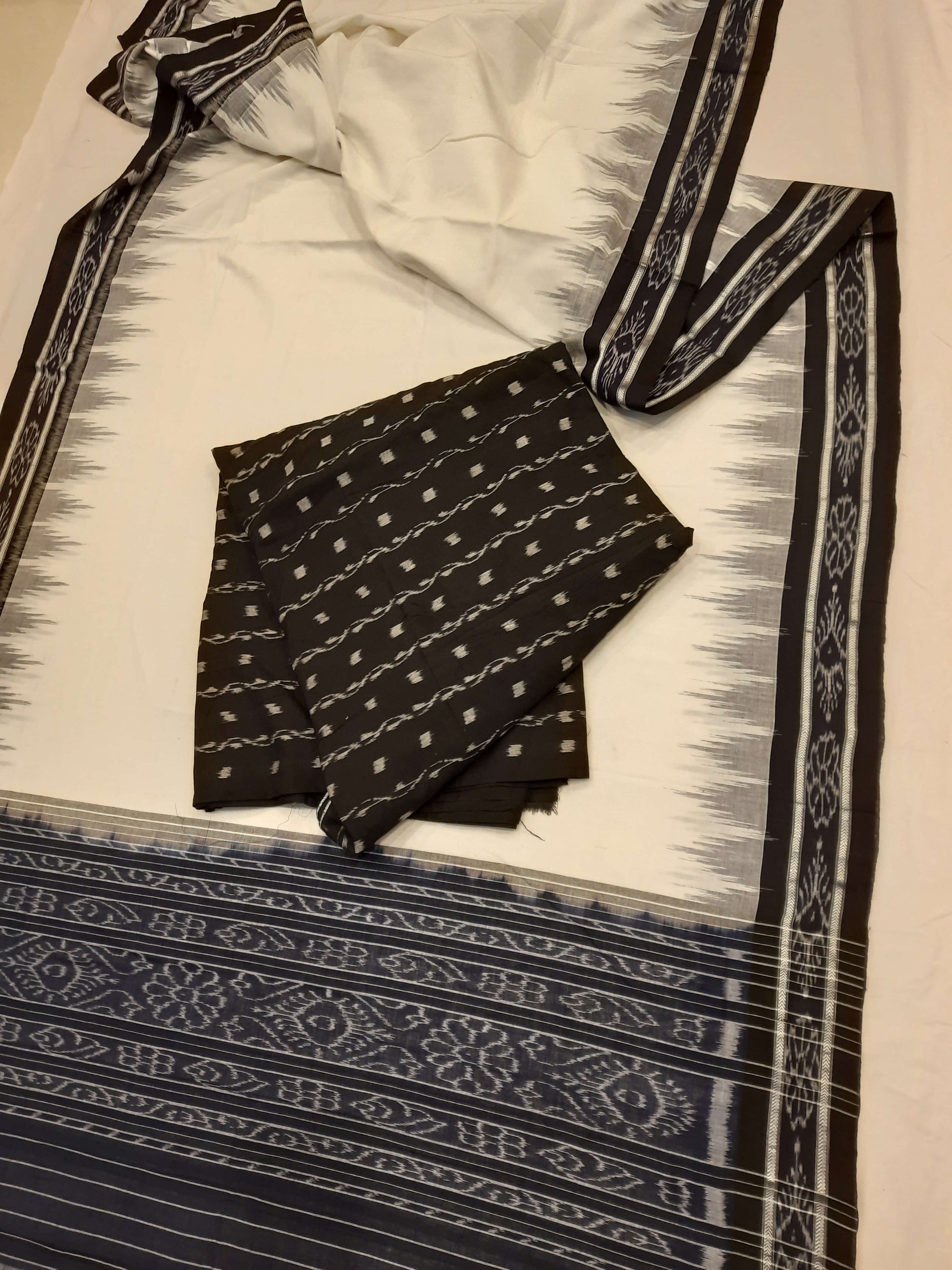 White and Black Odisha Ikat saree with cotton ikat blouse piece