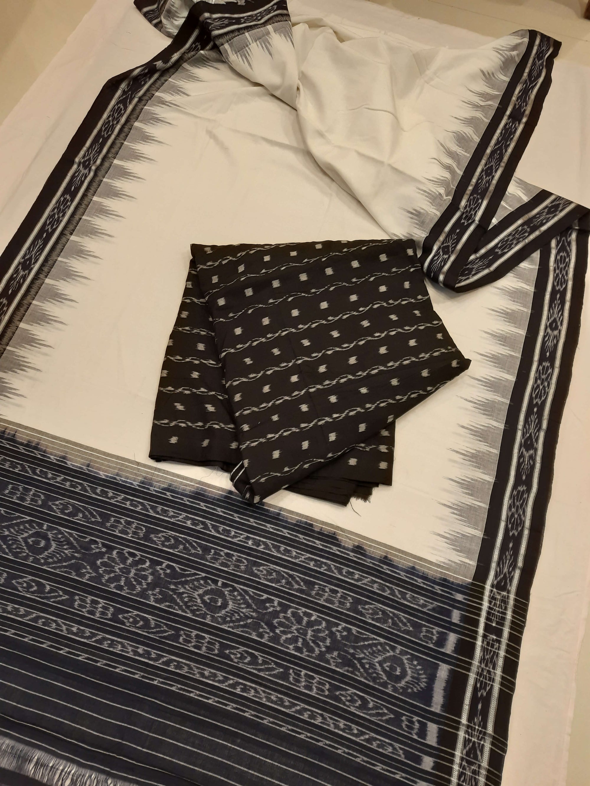 White and Black Odisha Ikat saree with cotton ikat blouse piece