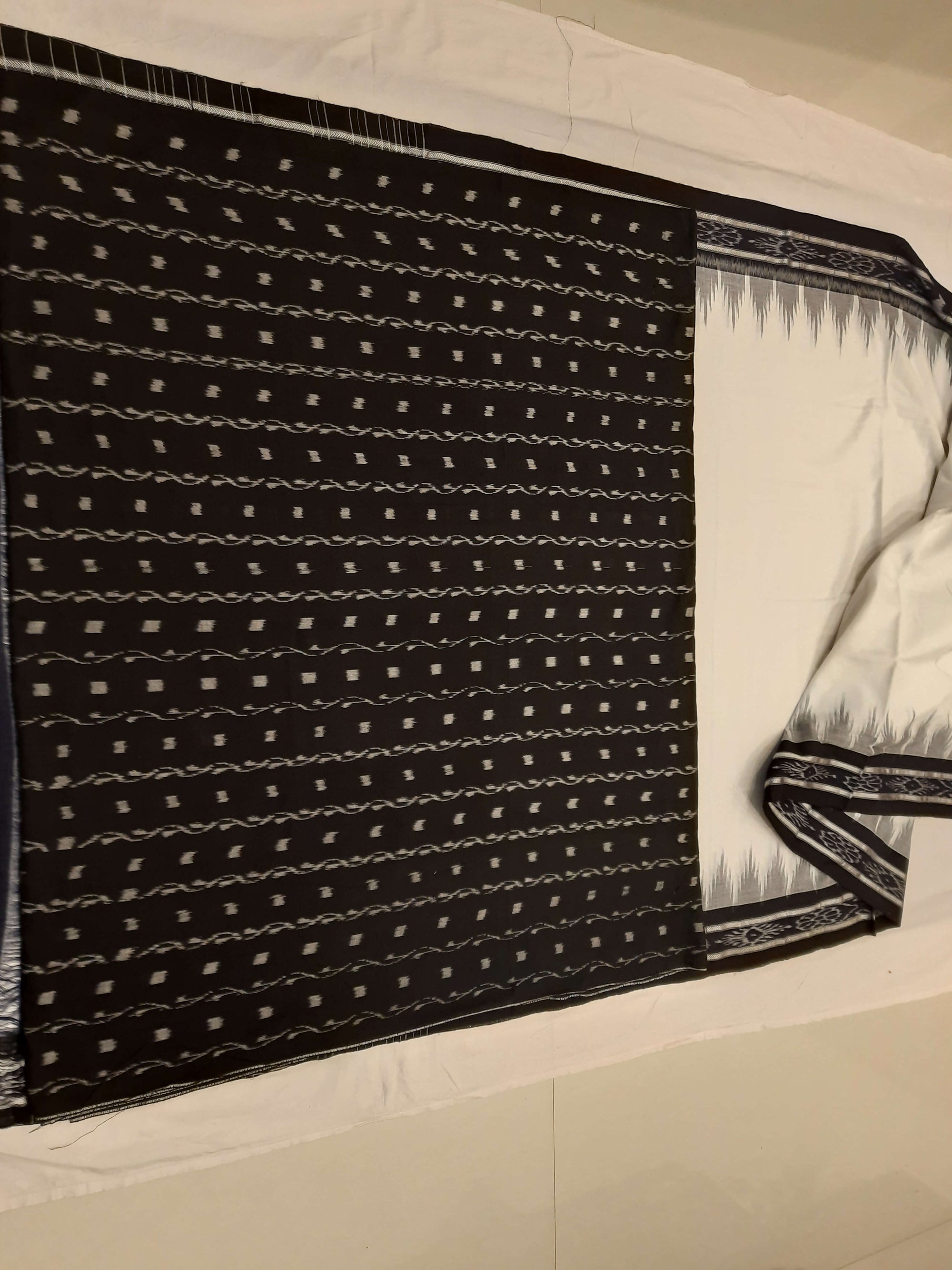 White and Black Odisha Ikat saree with cotton ikat blouse piece