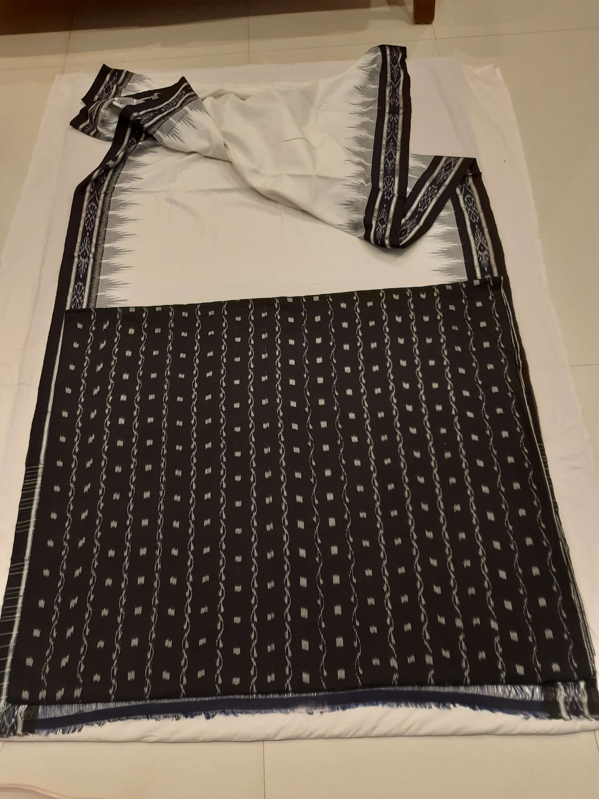 White and Black Odisha Ikat saree with cotton ikat blouse piece