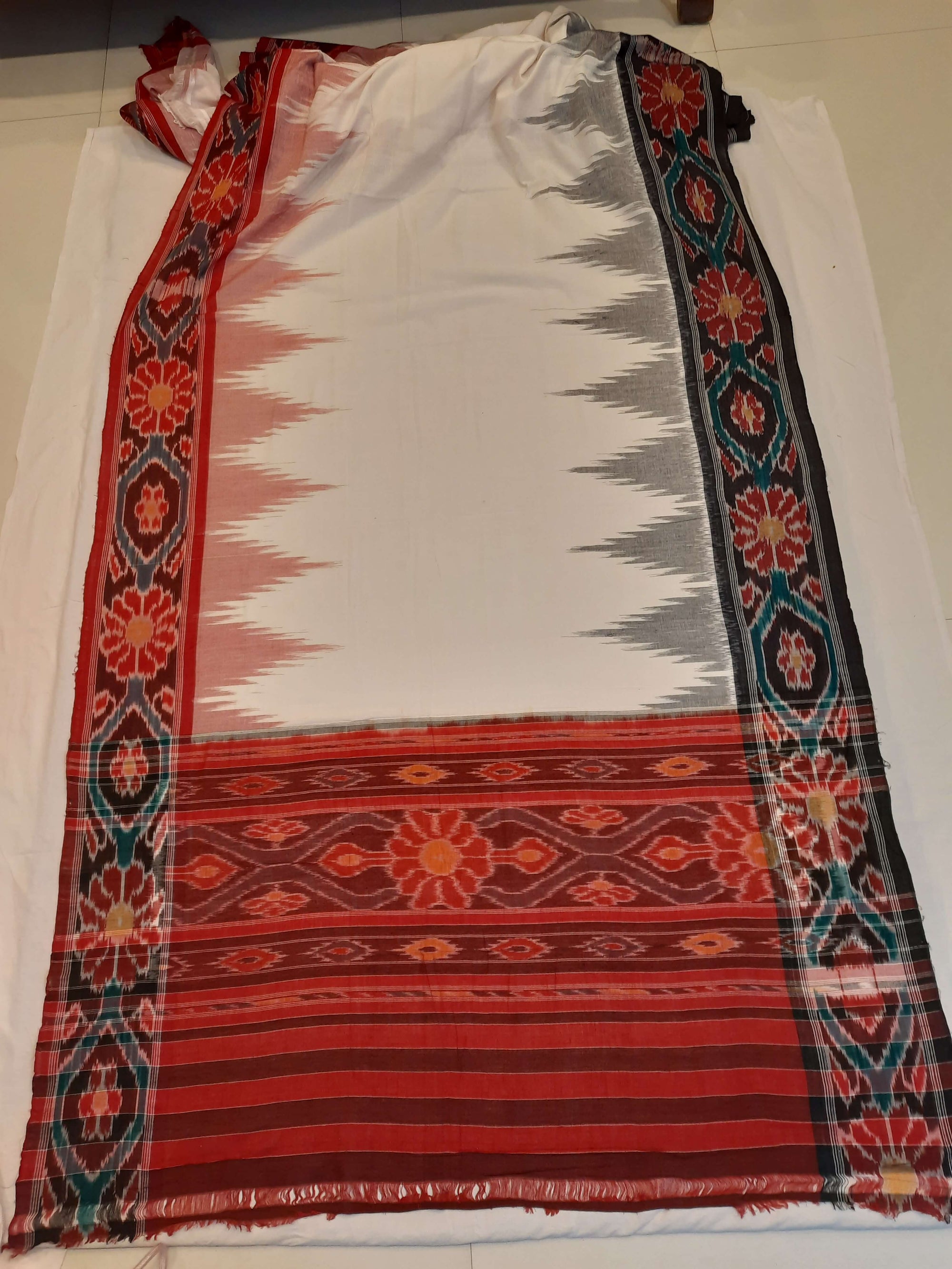 White GangaJamuna border Cotton Odisha Ikat saree with mix match cotton ikat blouse