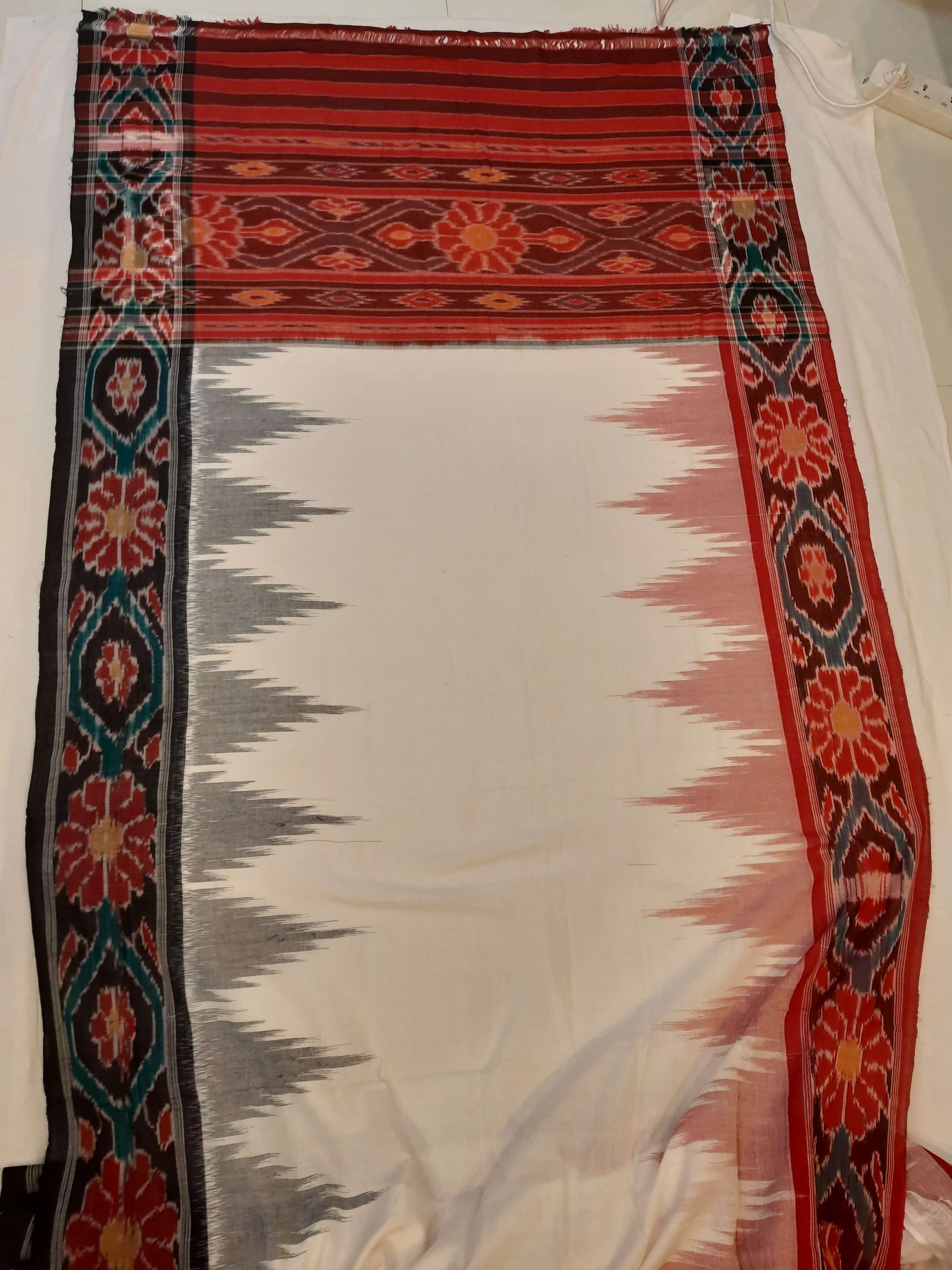 White GangaJamuna border Cotton Odisha Ikat saree with mix match cotton ikat blouse