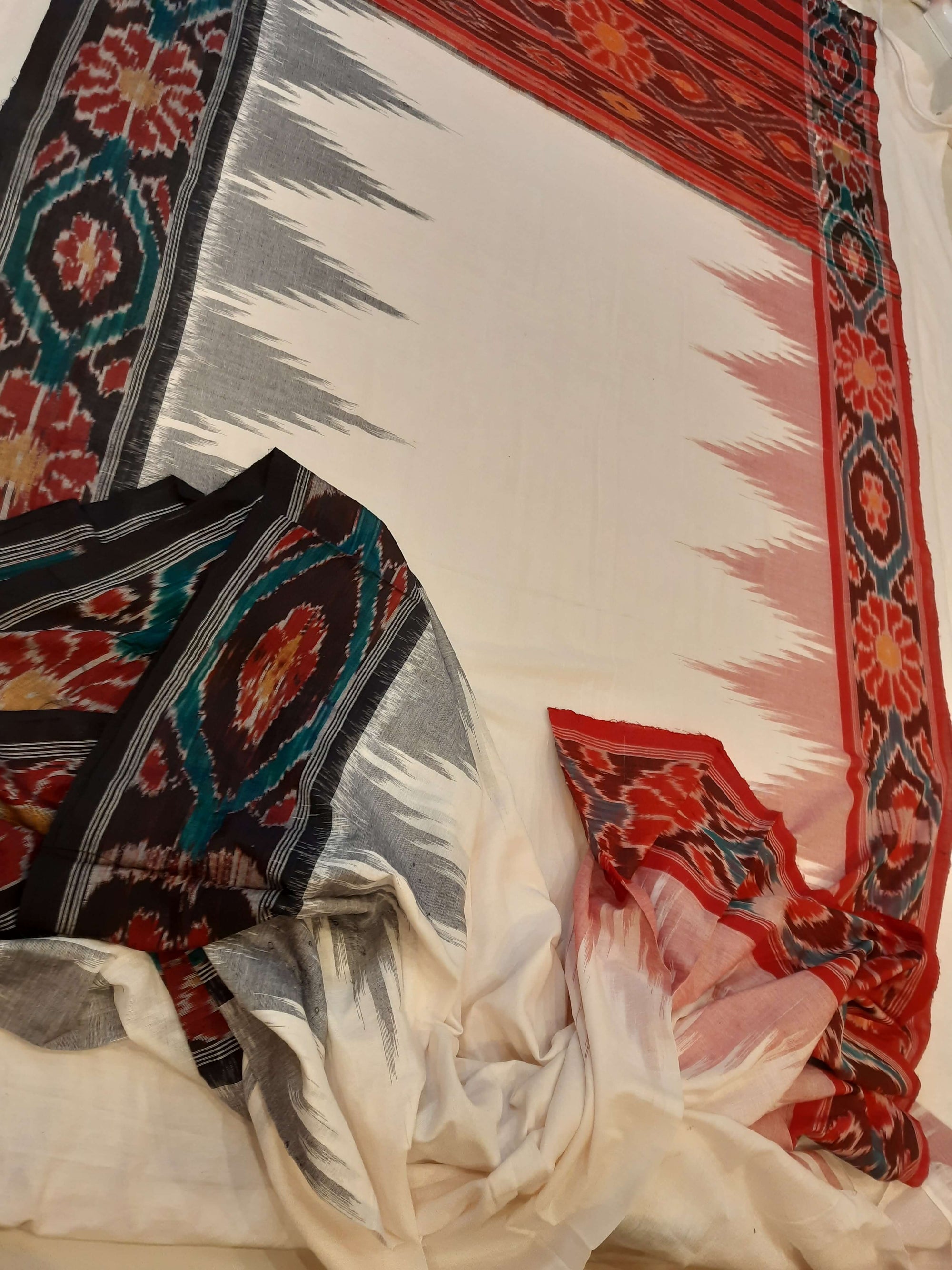 White GangaJamuna border Cotton Odisha Ikat saree with mix match cotton ikat blouse