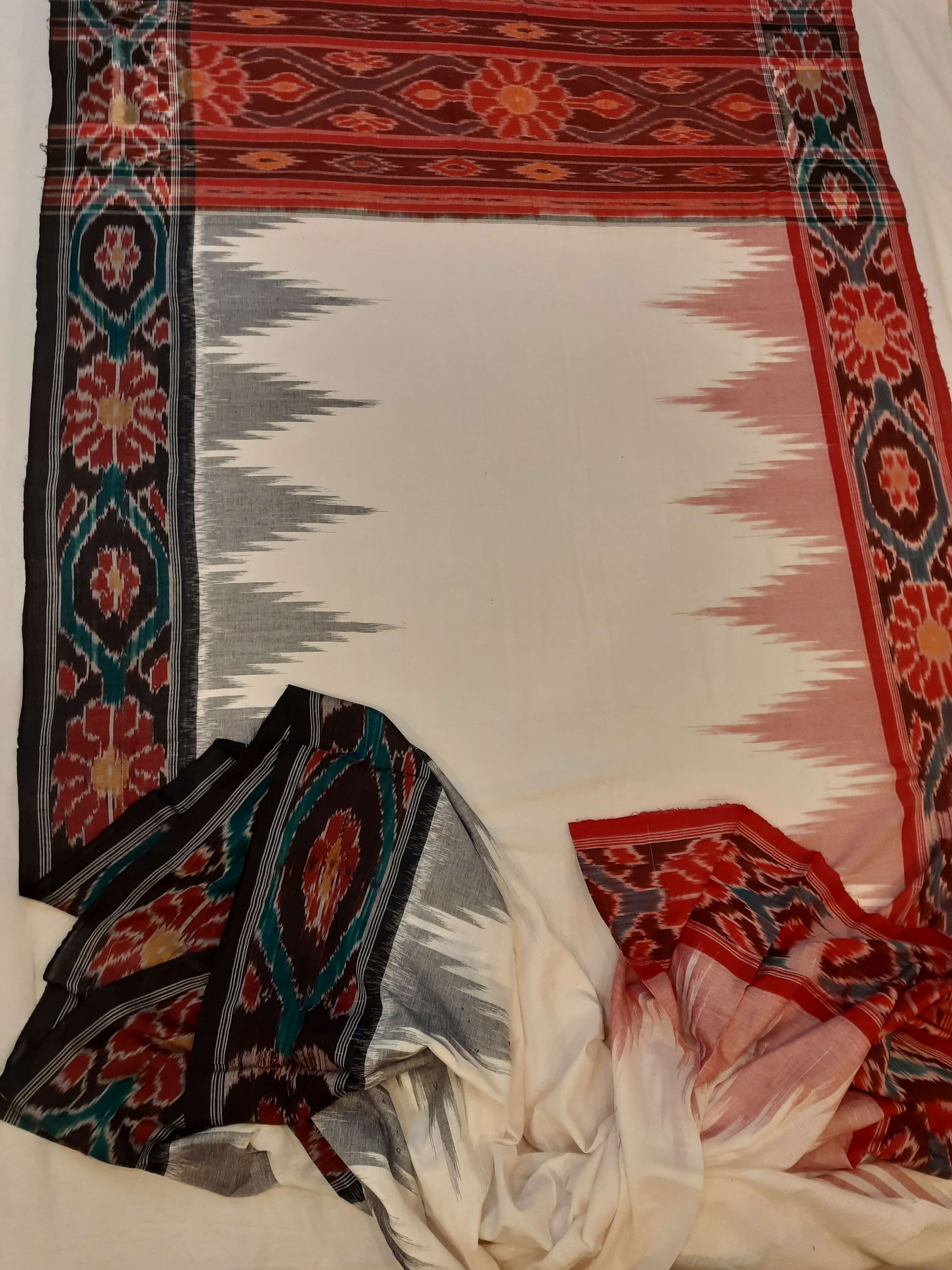 White GangaJamuna border Cotton Odisha Ikat saree with mix match cotton ikat blouse