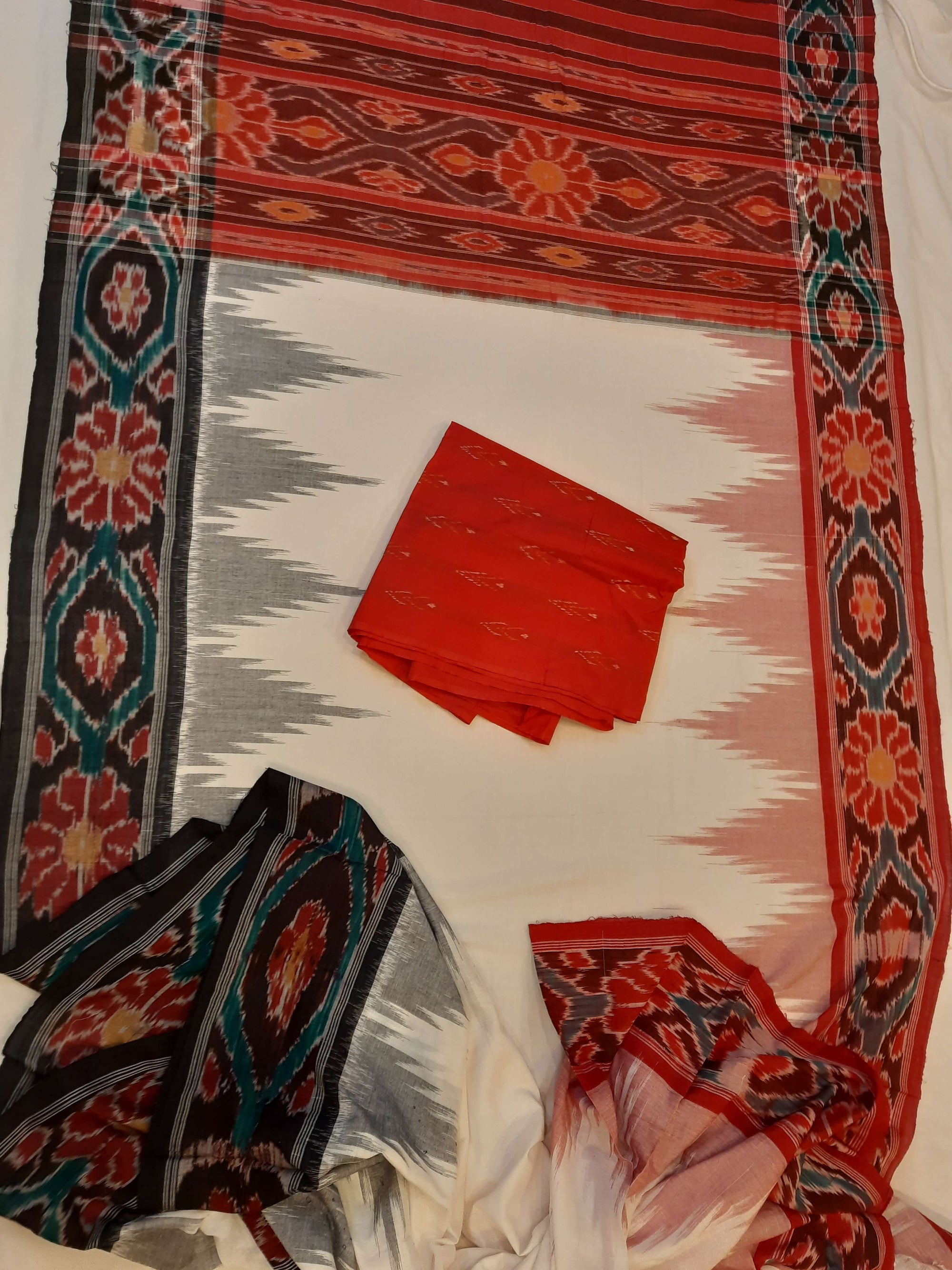 White GangaJamuna border Cotton Odisha Ikat saree with mix match cotton ikat blouse