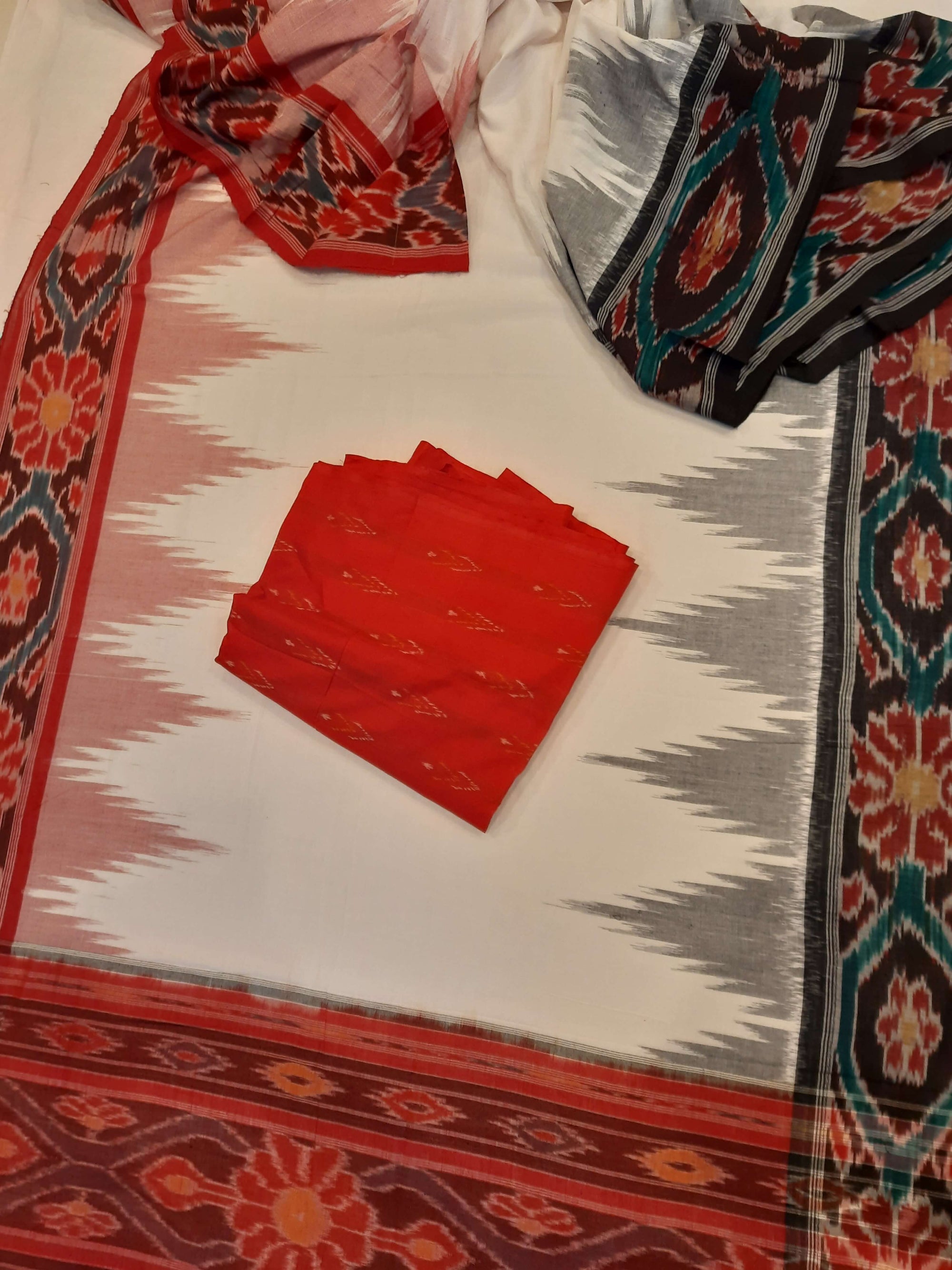 White GangaJamuna border Cotton Odisha Ikat saree with mix match cotton ikat blouse